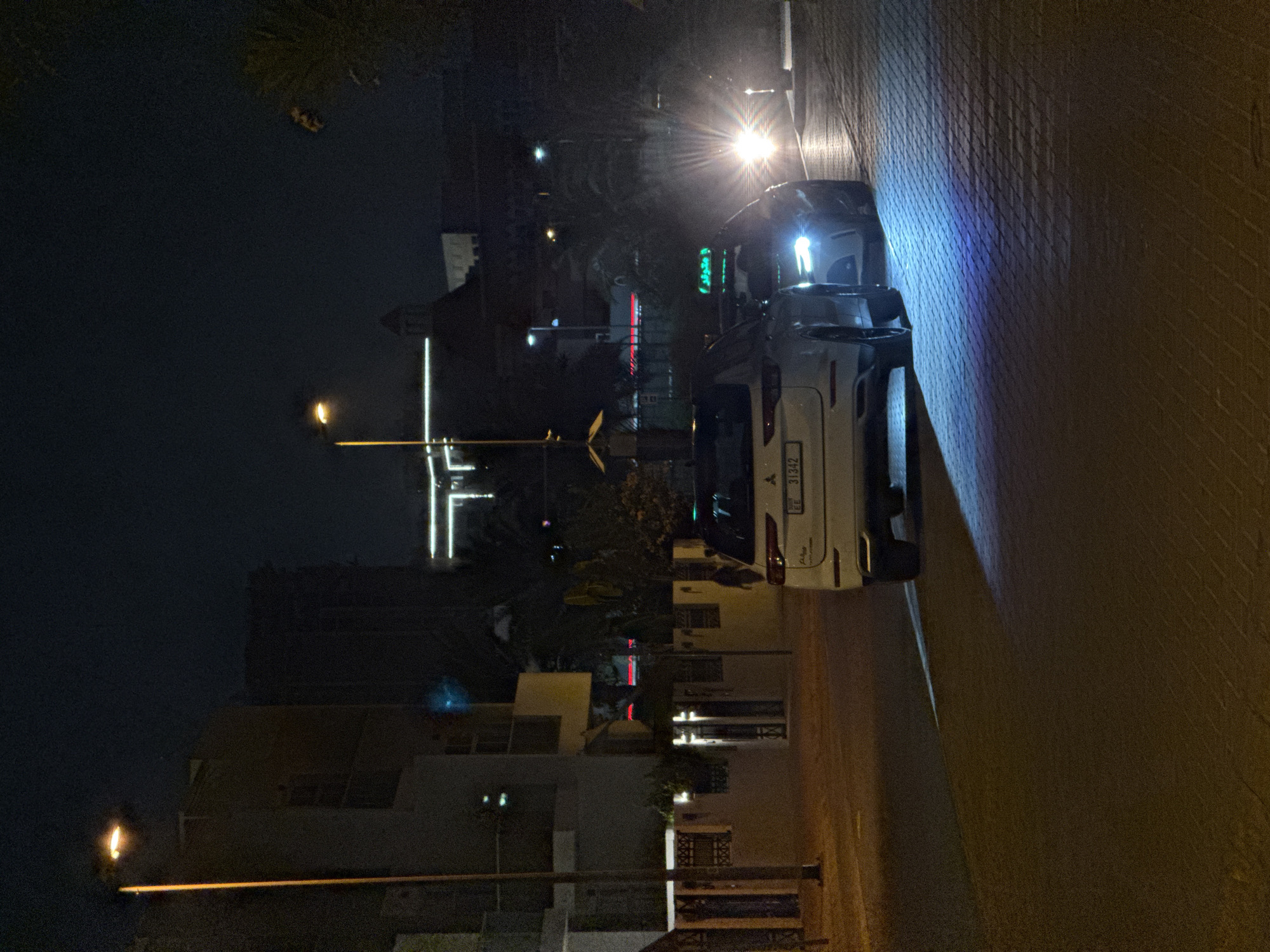 Late evening drive and convenience store stops across Dubai