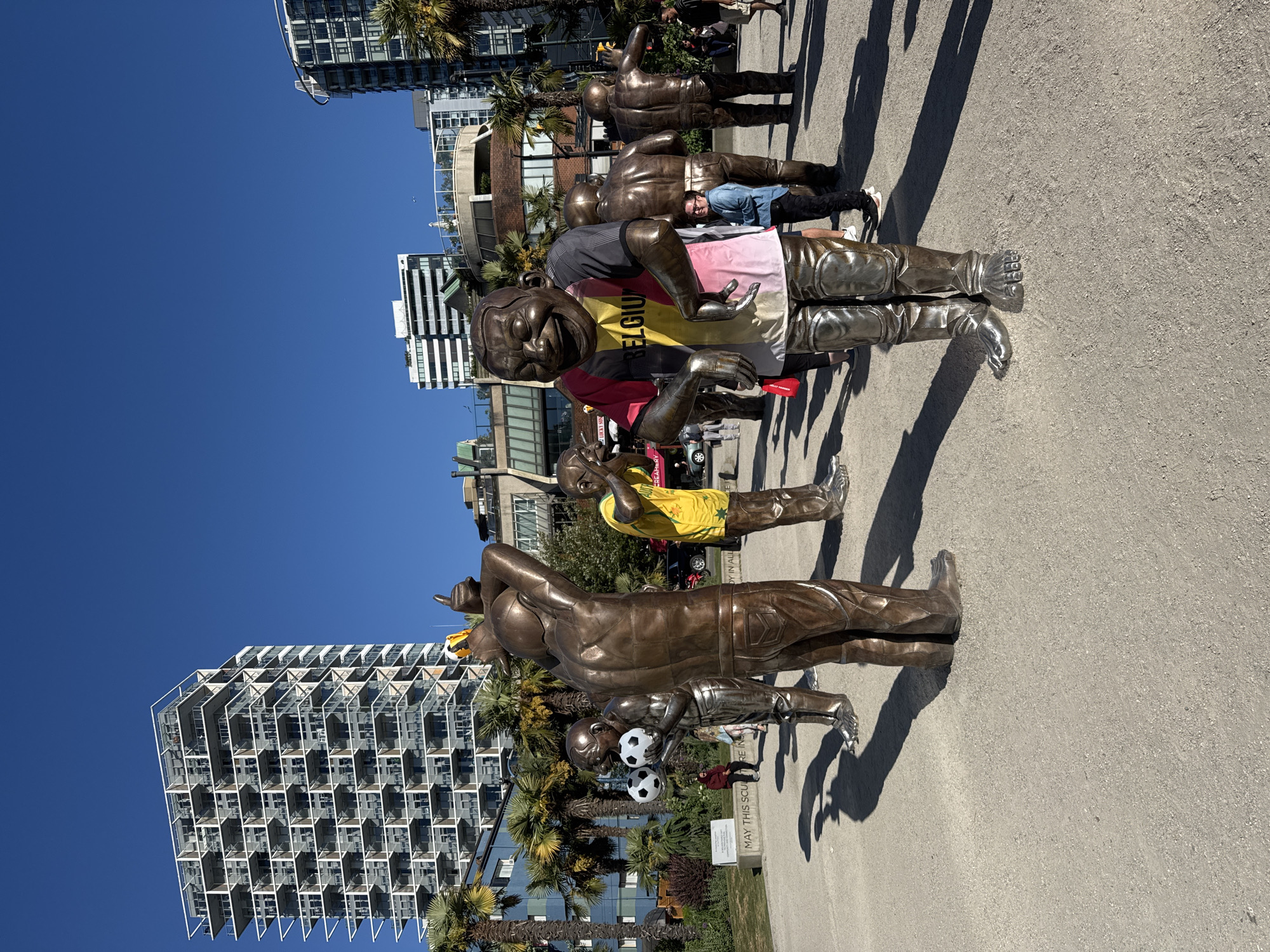 Vancouver's laughing bronze statues captured at Morton Park