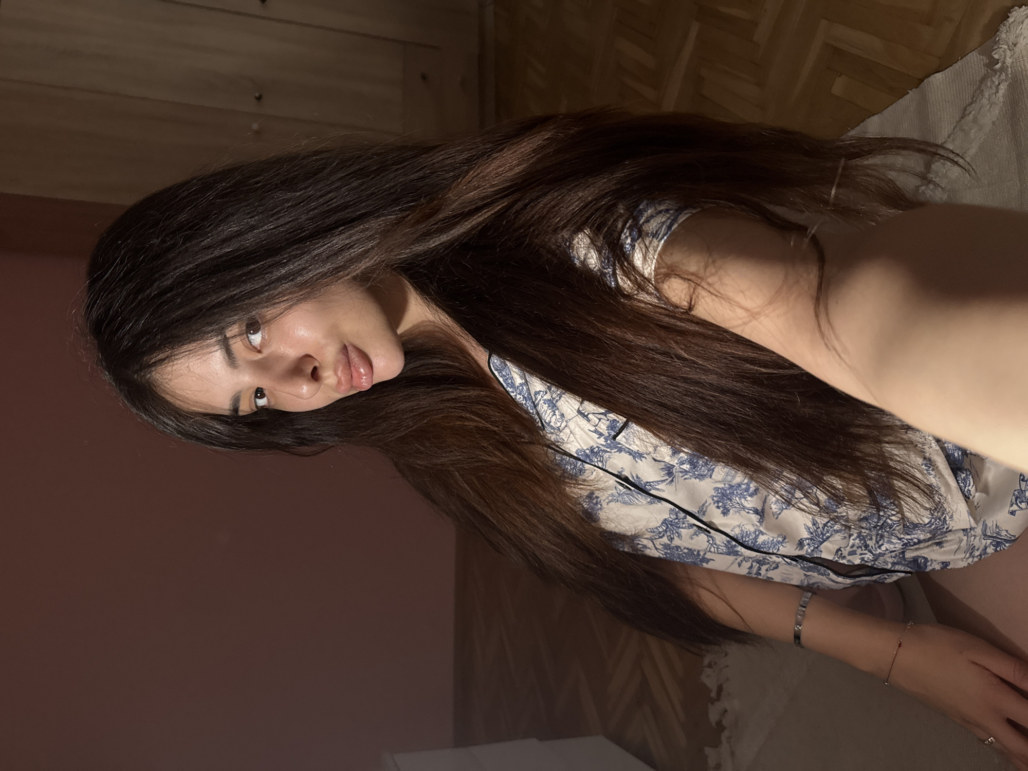 Woman documents evening selfie session in Plovdiv bedroom