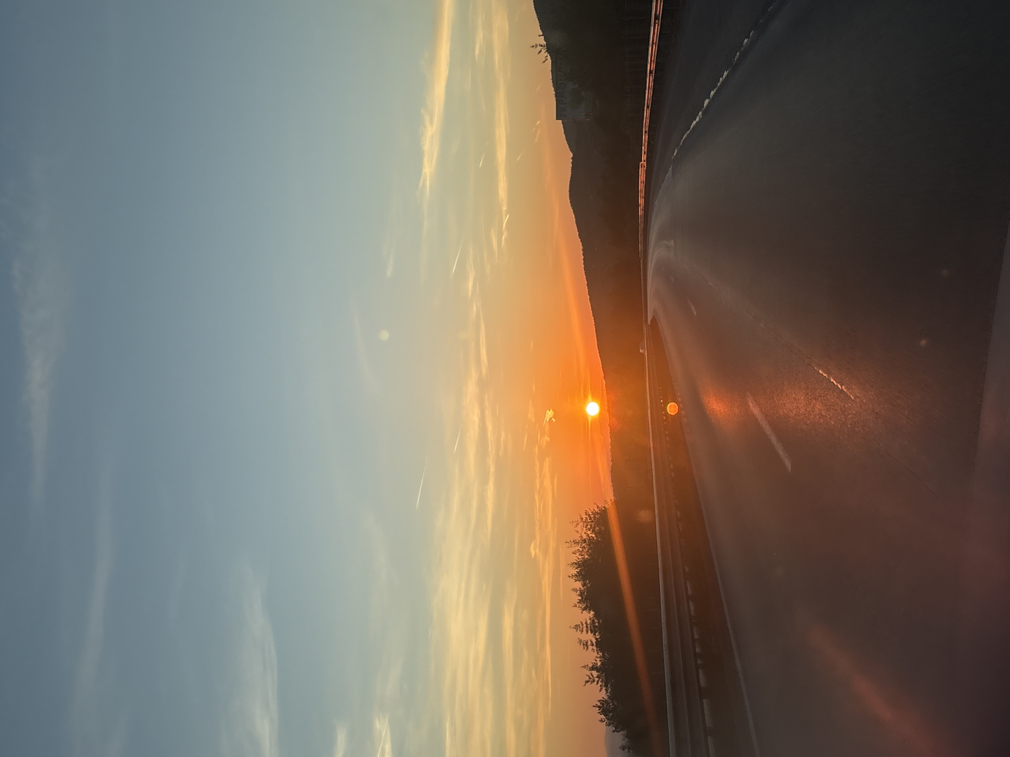 Sunset observed from vehicles near Bulgarian villages