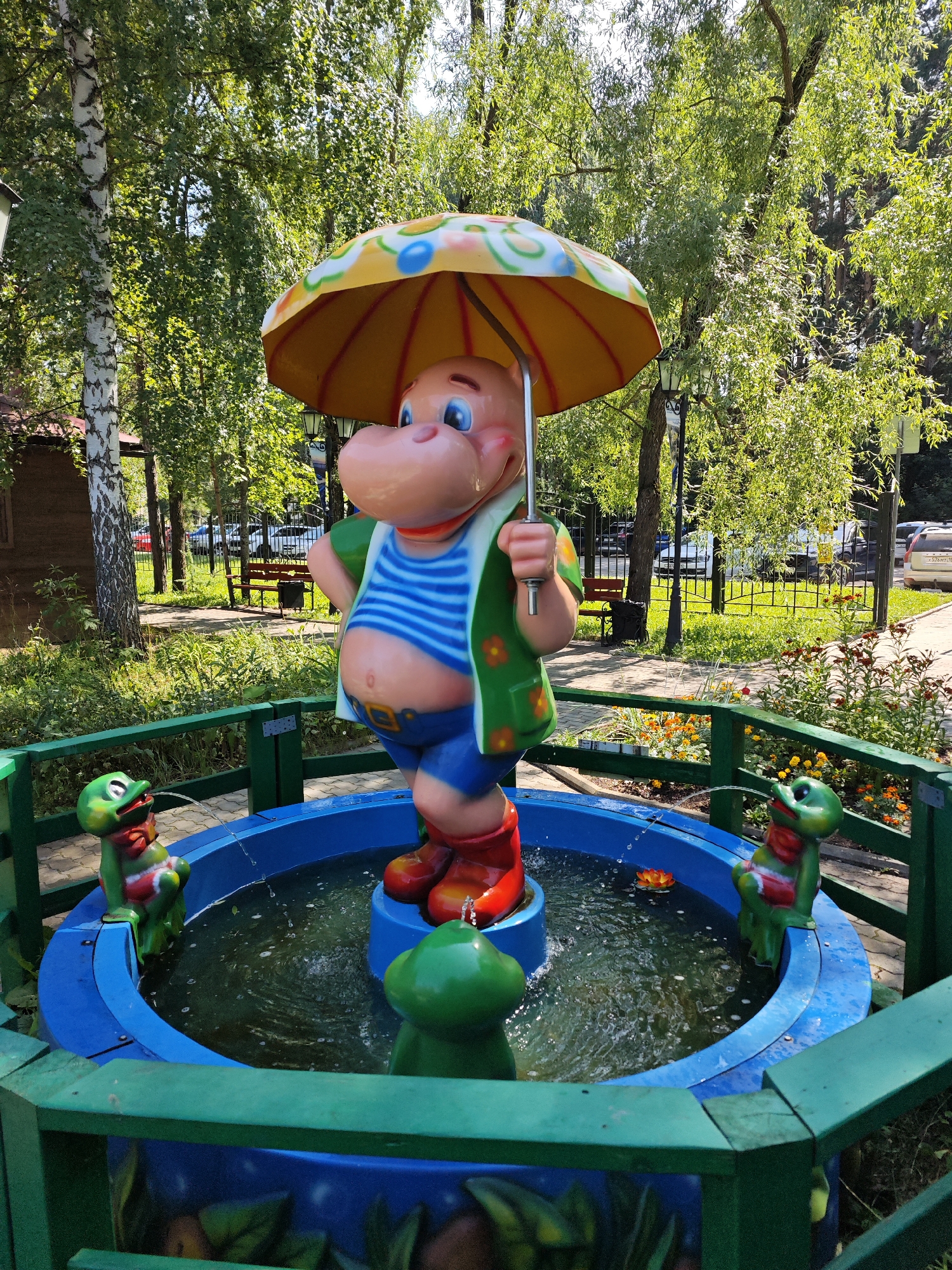 Summer morning in a Chaikovsky park, fountains to duck ponds