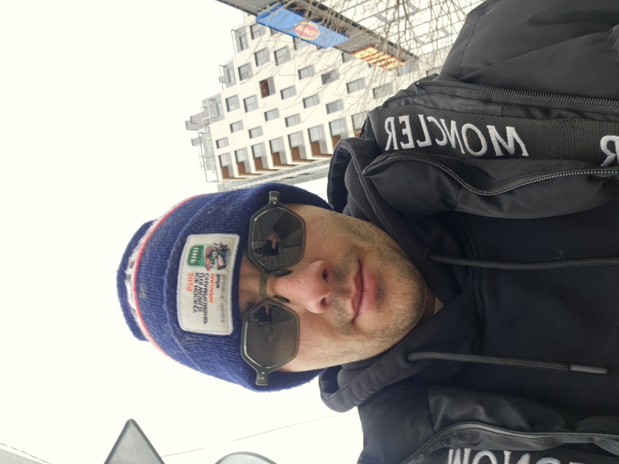 Man takes morning selfie in Sofia wearing designer jacket