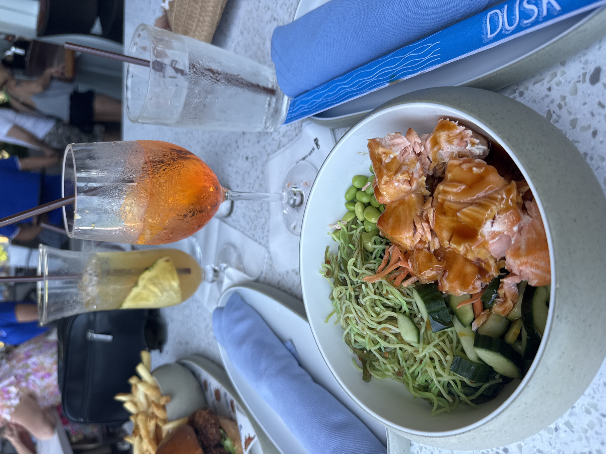 Dining and drinks captured at Pelican Bay beachside locations