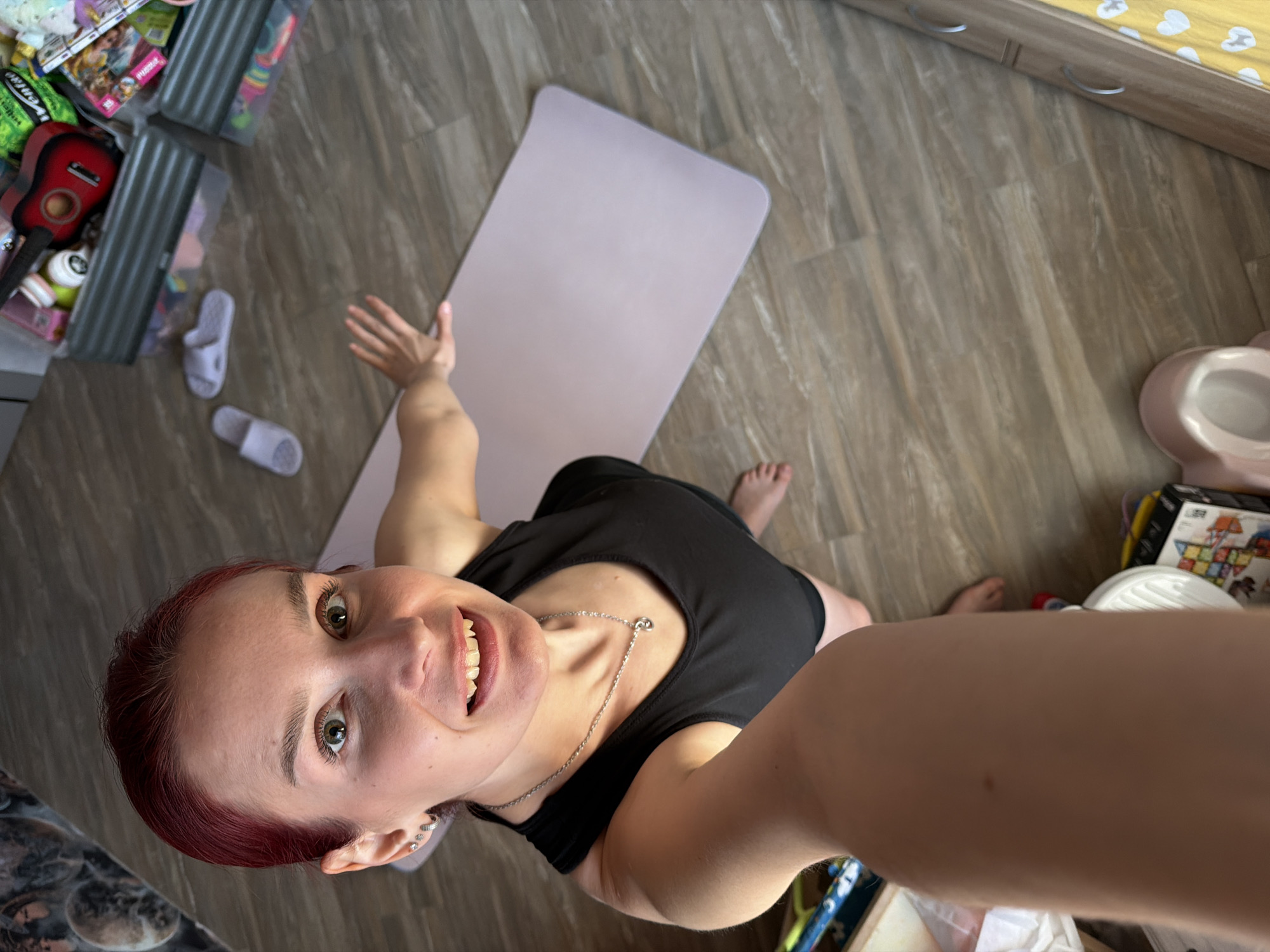 Red-haired woman photographed during afternoon in Chaikovsky, Russia