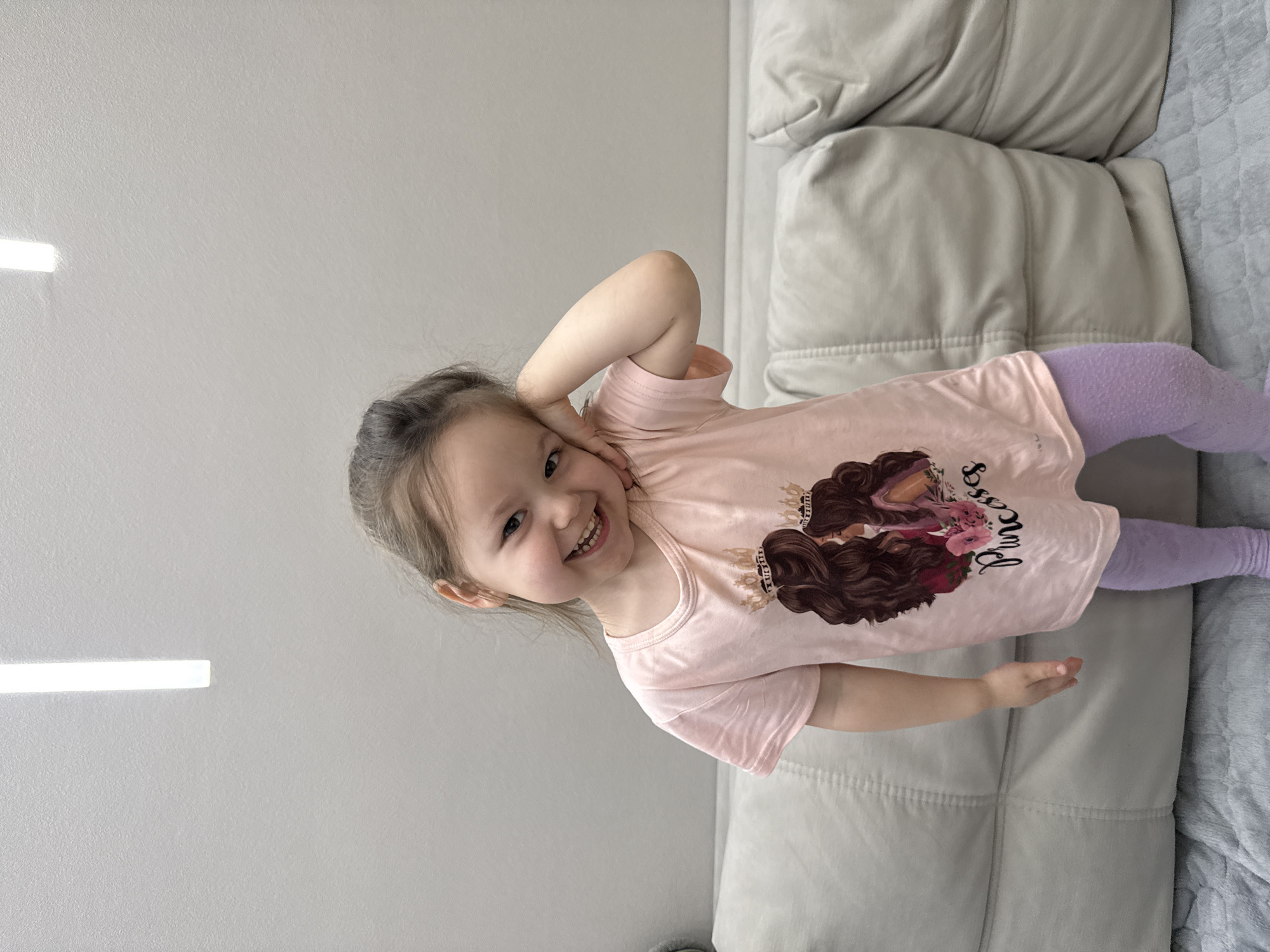 Child photographed smiling indoors in Izhevsk, Russia