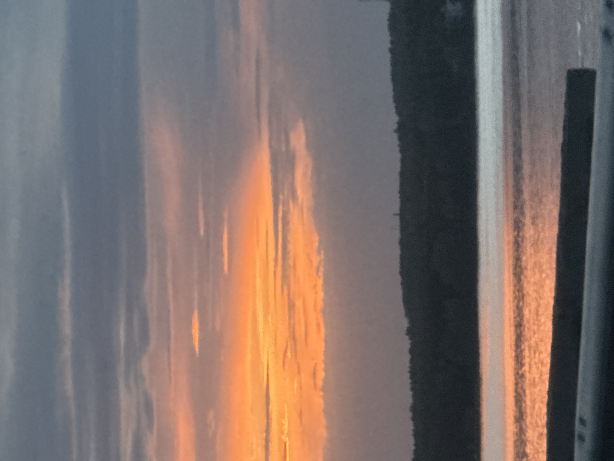 Sunset observed over water in Chaikovsky, Russia