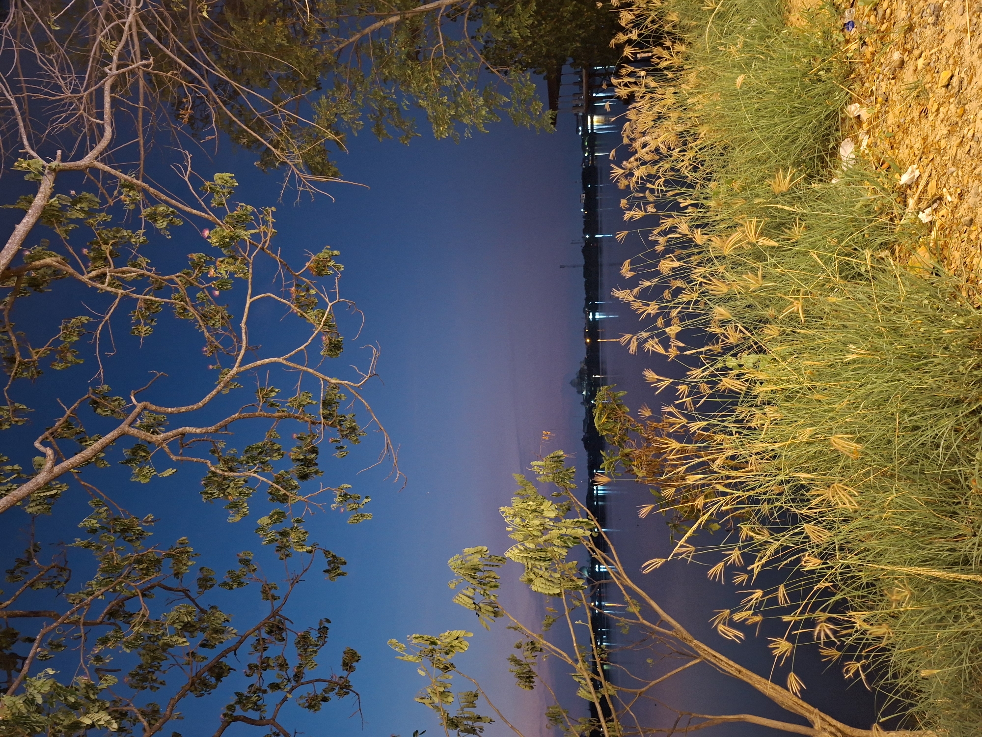 Evening scenes documented across Lhokseumawe's illuminated waterfront district