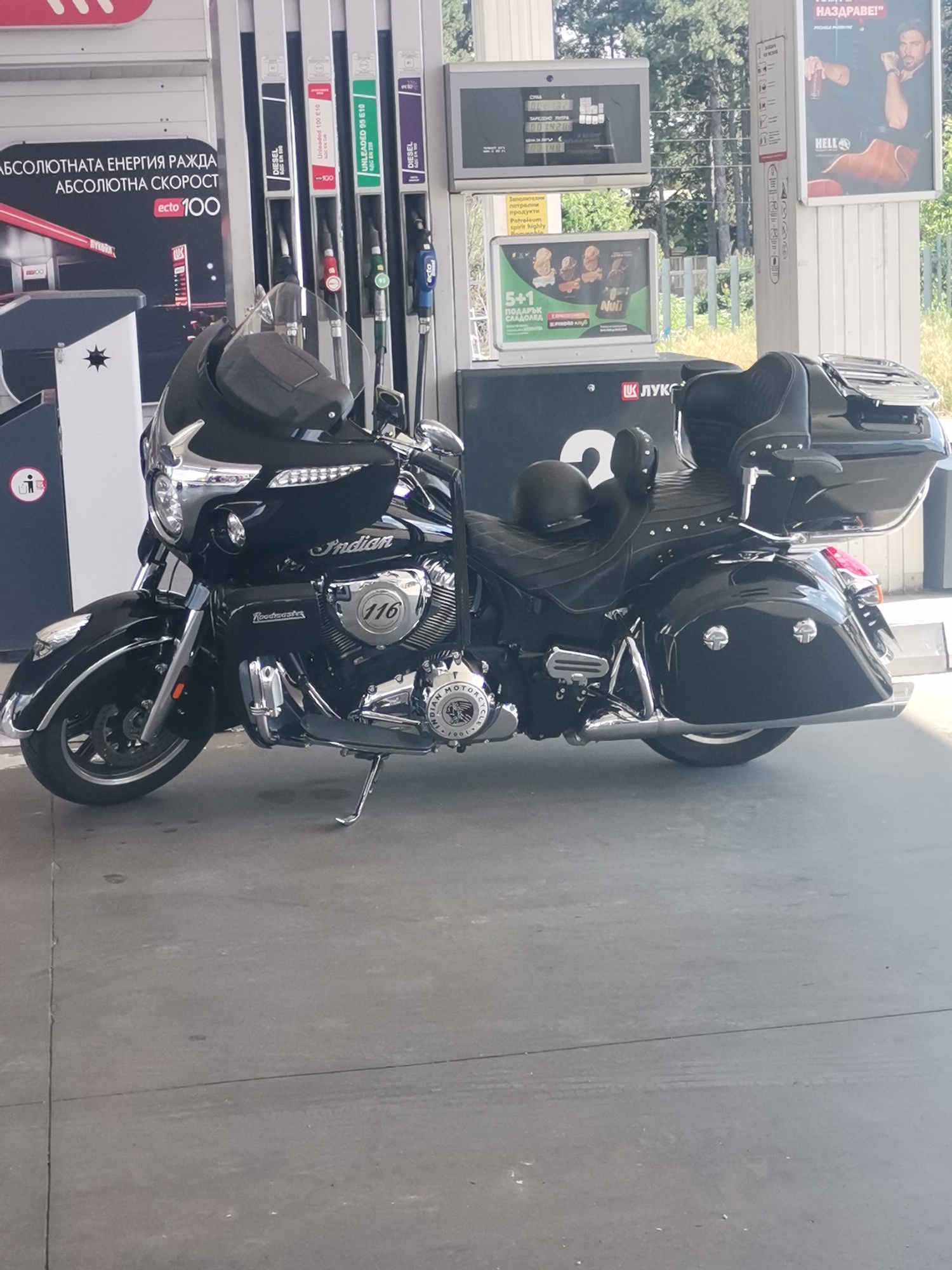 Black Indian Roadmaster parked at a Byala gas station