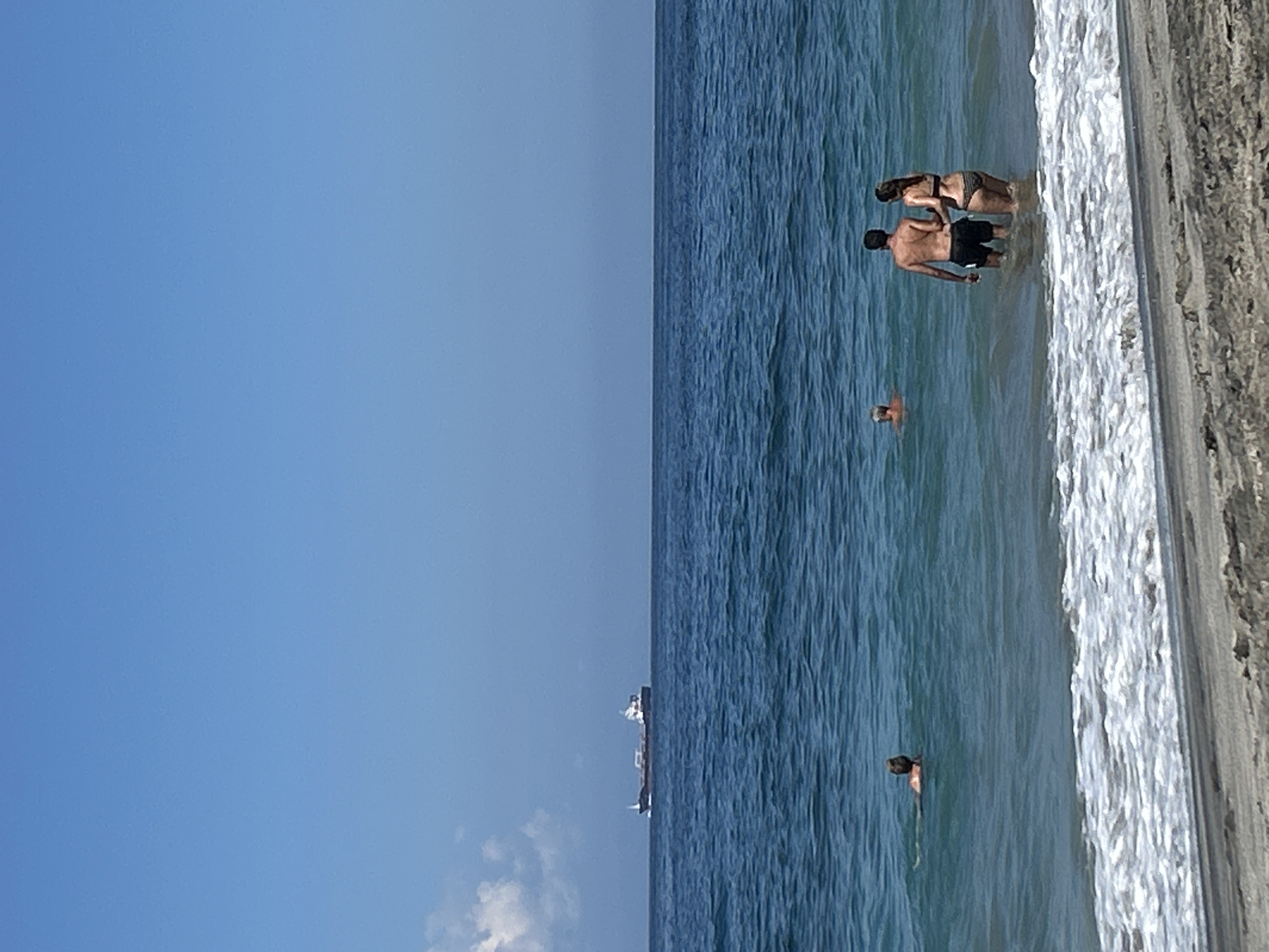 Lazy morning at a black sand beach in Karangasem, Bali