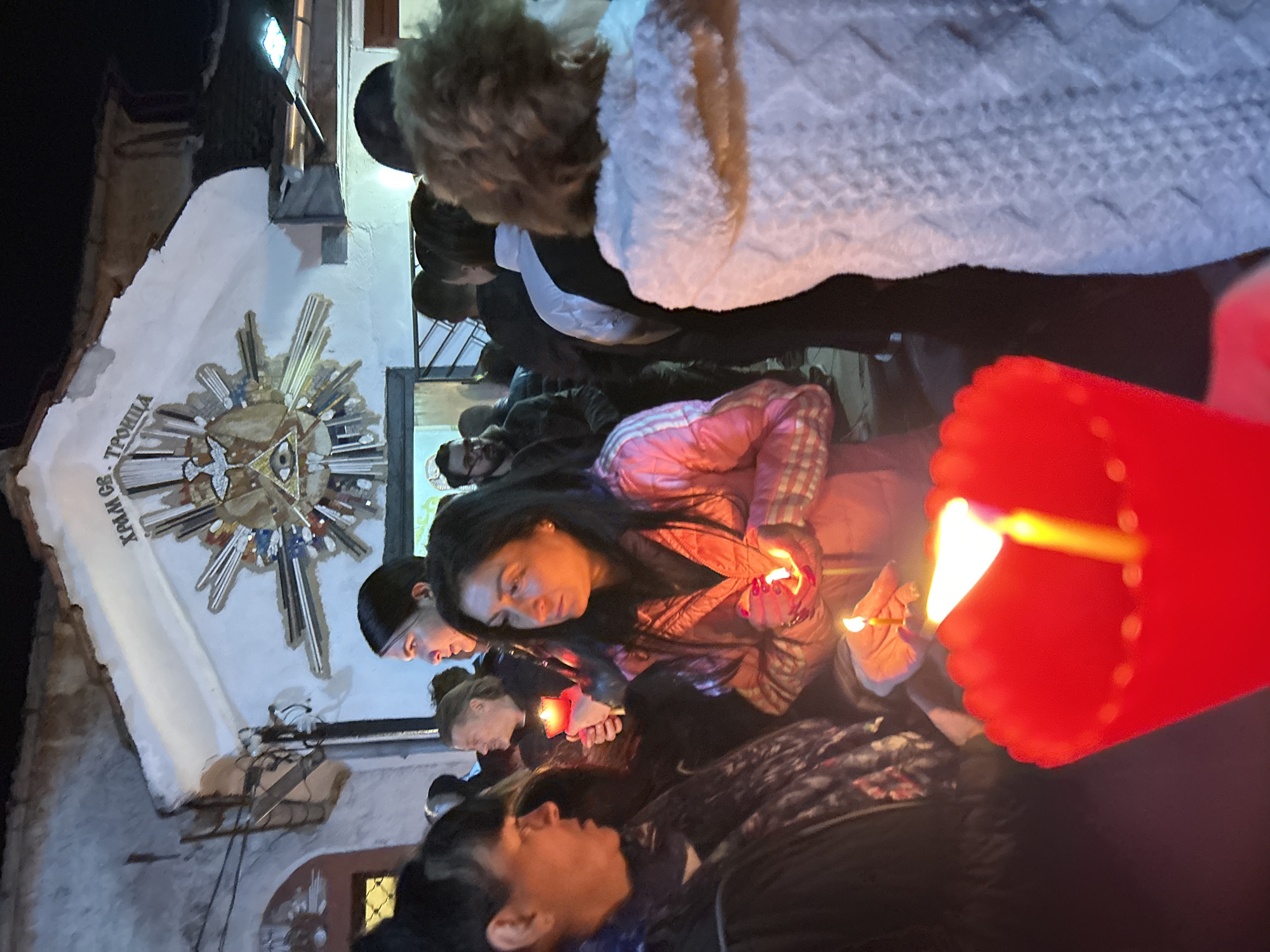 Candlelight gathering at religious building in Markovo, Bulgaria