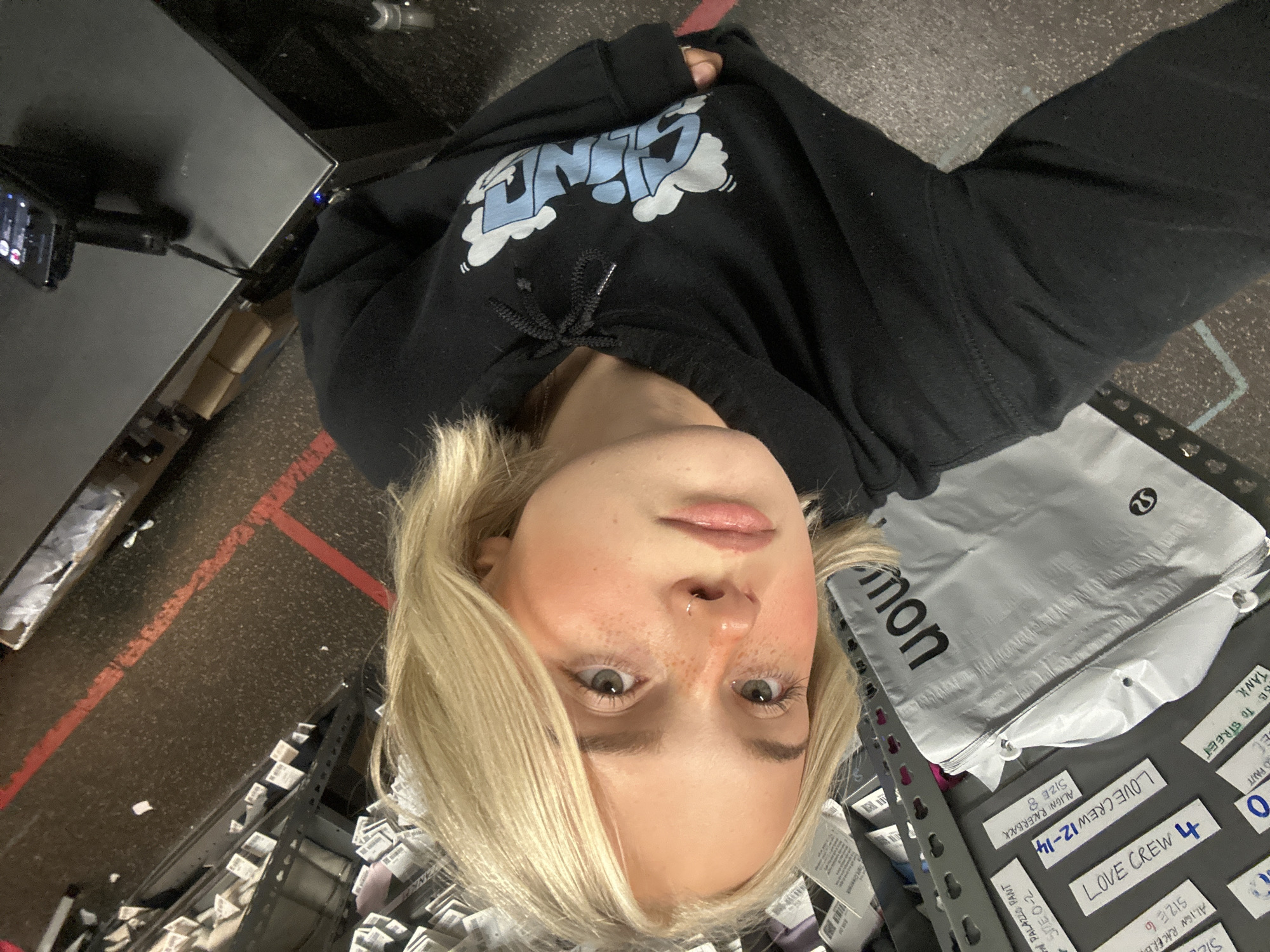 Woman takes selfies in Whistler retail spaces