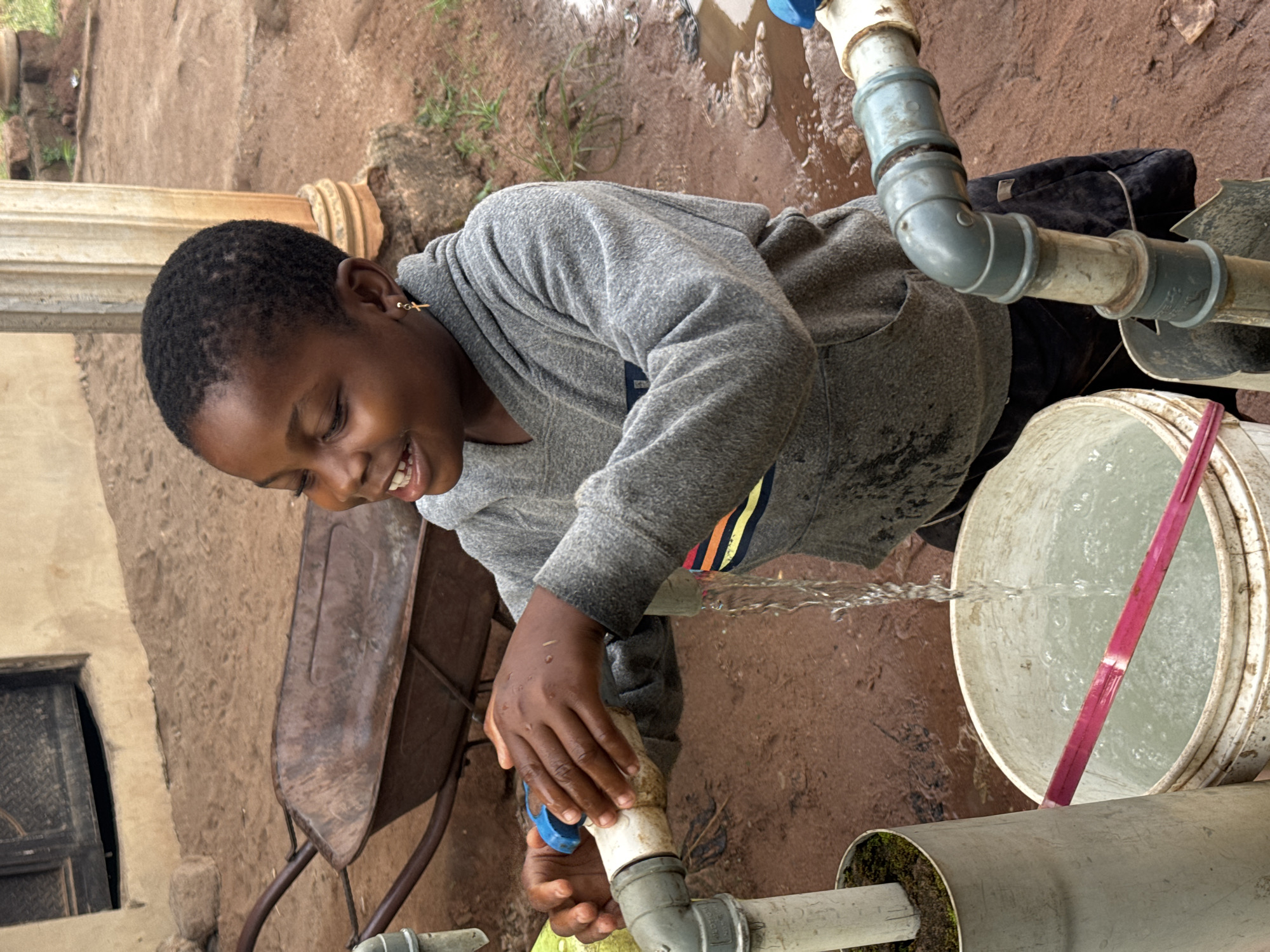 Morning water collection activities observed in Eziudo, Nigeria