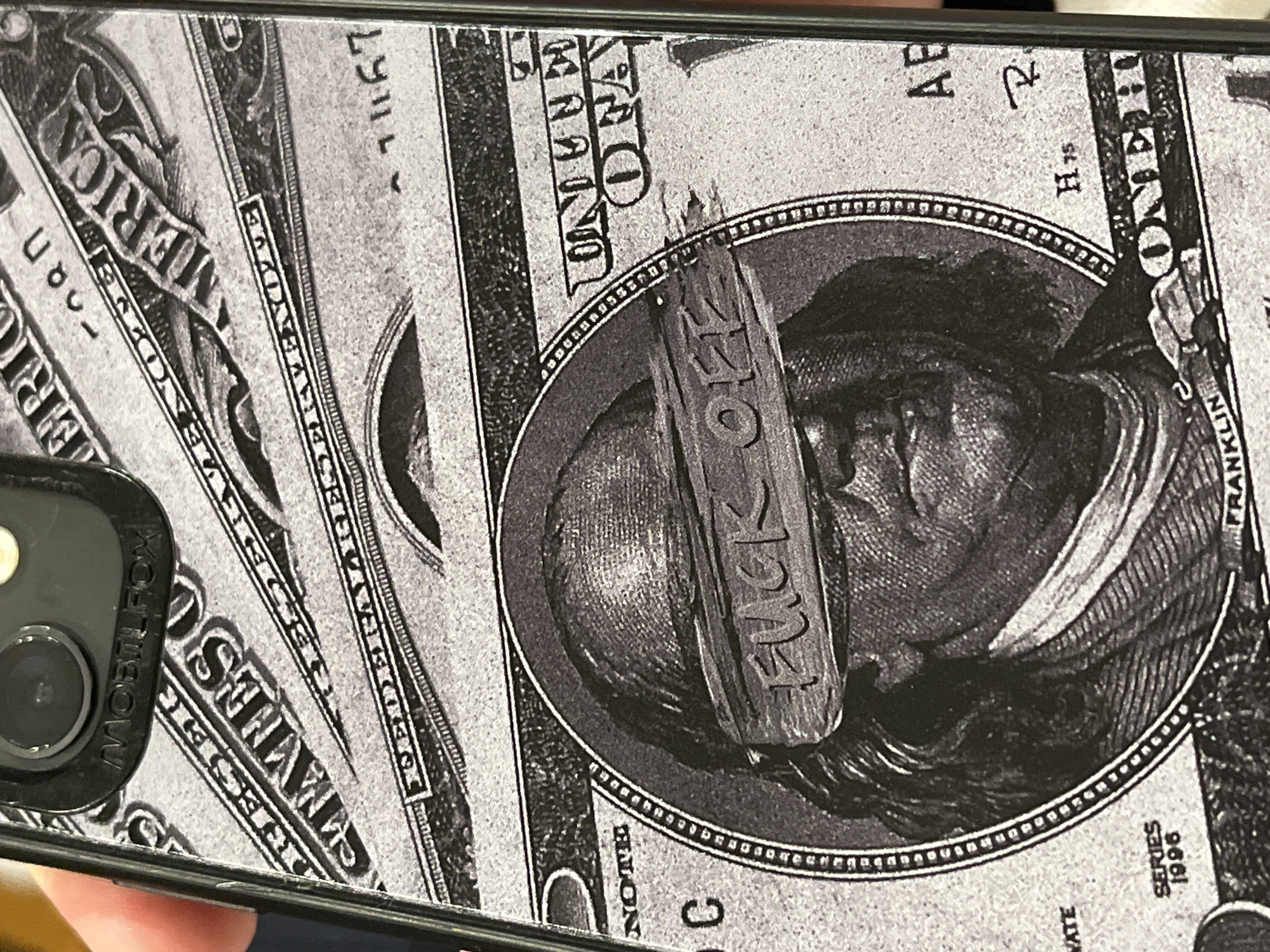 Phone case with dollar bill design spotted in Varna