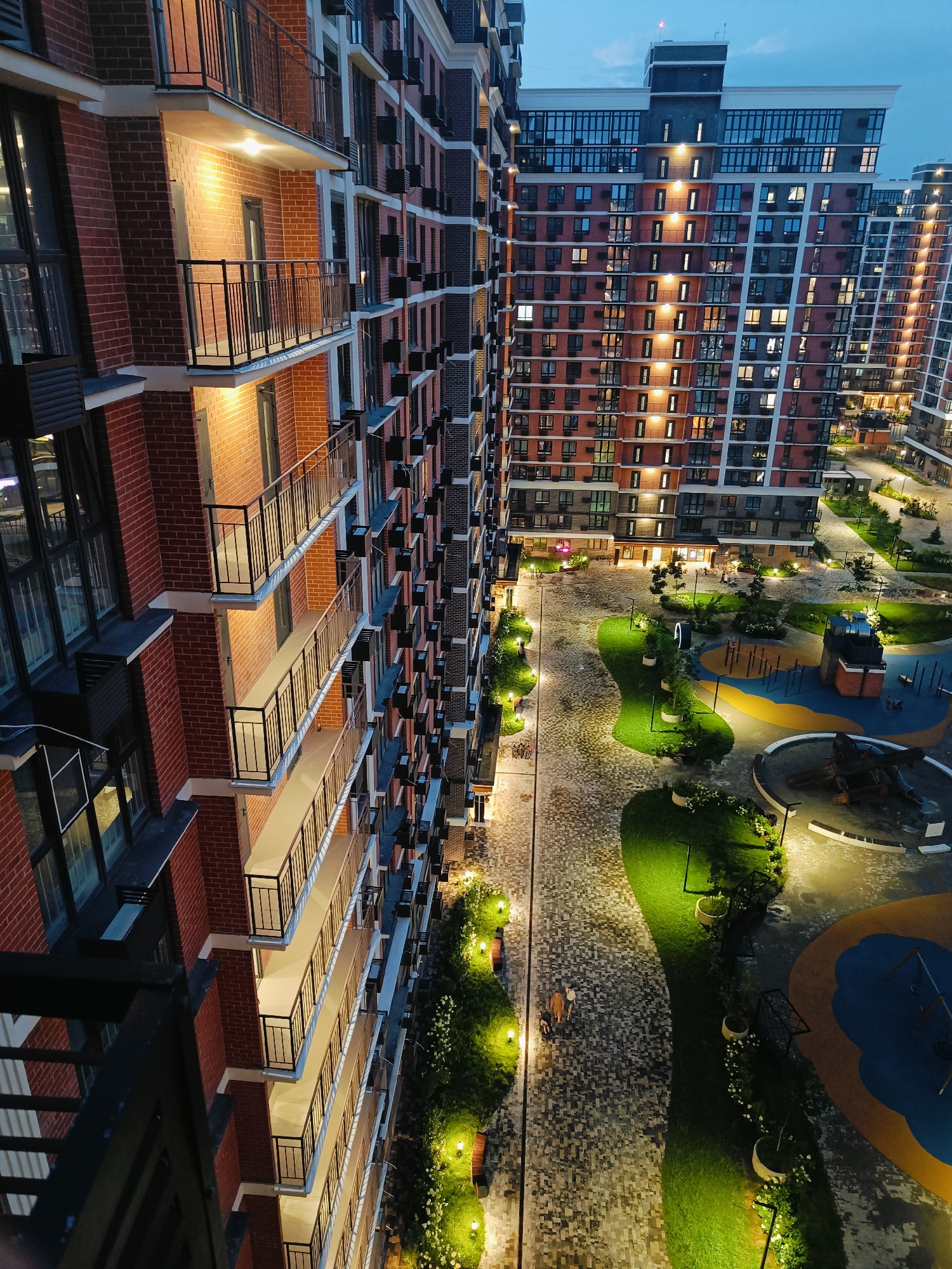 Aerial dusk views of a Krasnodar residential complex and playground