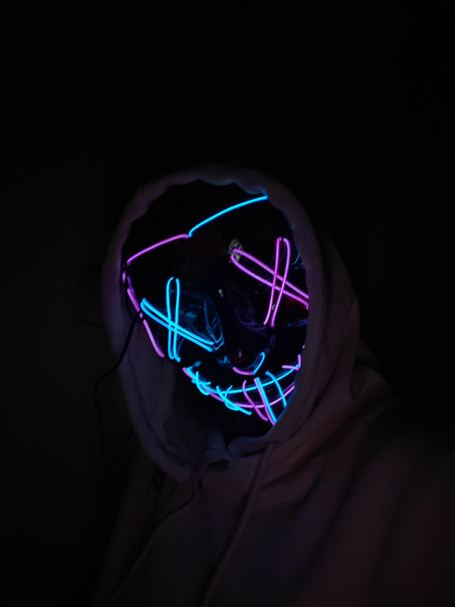 Individual spotted wearing glowing neon mask in Saint Petersburg