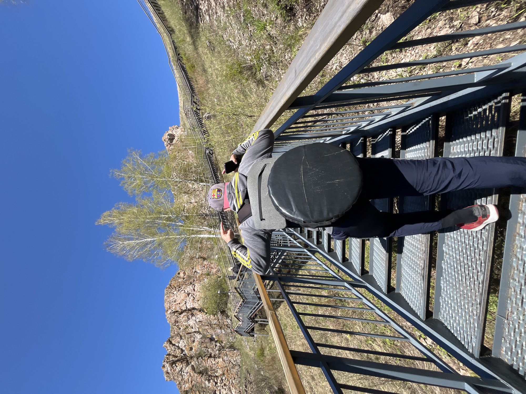 Morning visitors climb Torgashinsky Ridge staircase in Krasnoyarsk