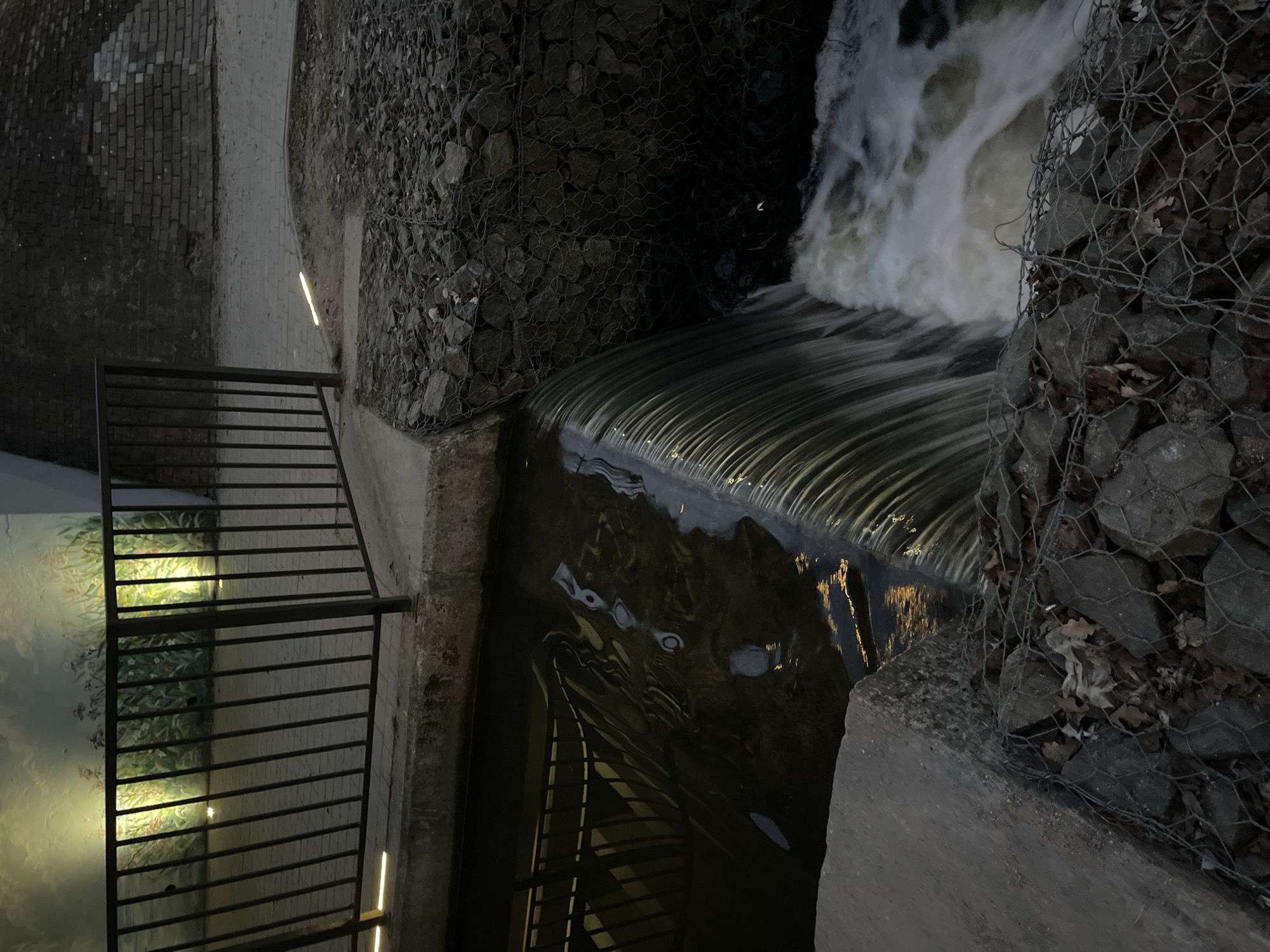 Rapid water flow observed over concrete weir in Chernyakhovsk