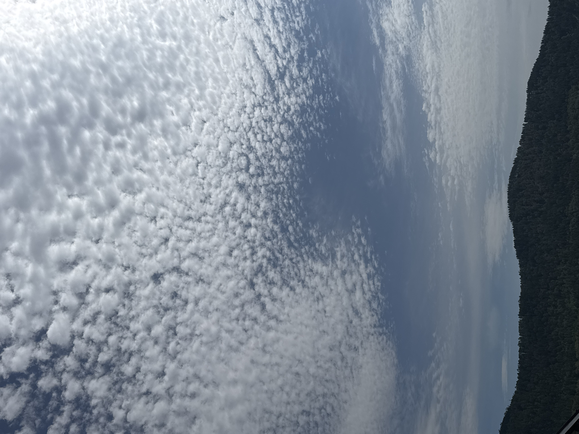 Altocumulus clouds over open landscape near Манский, Russia