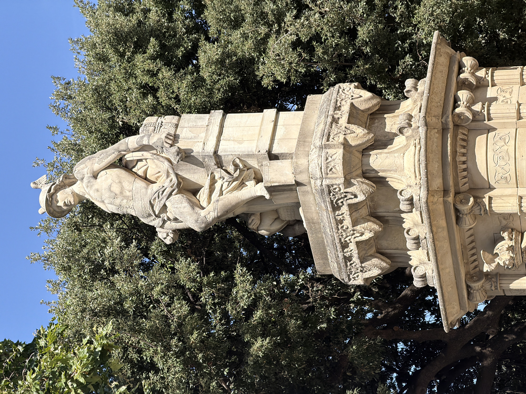 Arc de Triomf promenade buzzing on a sunny Barcelona afternoon