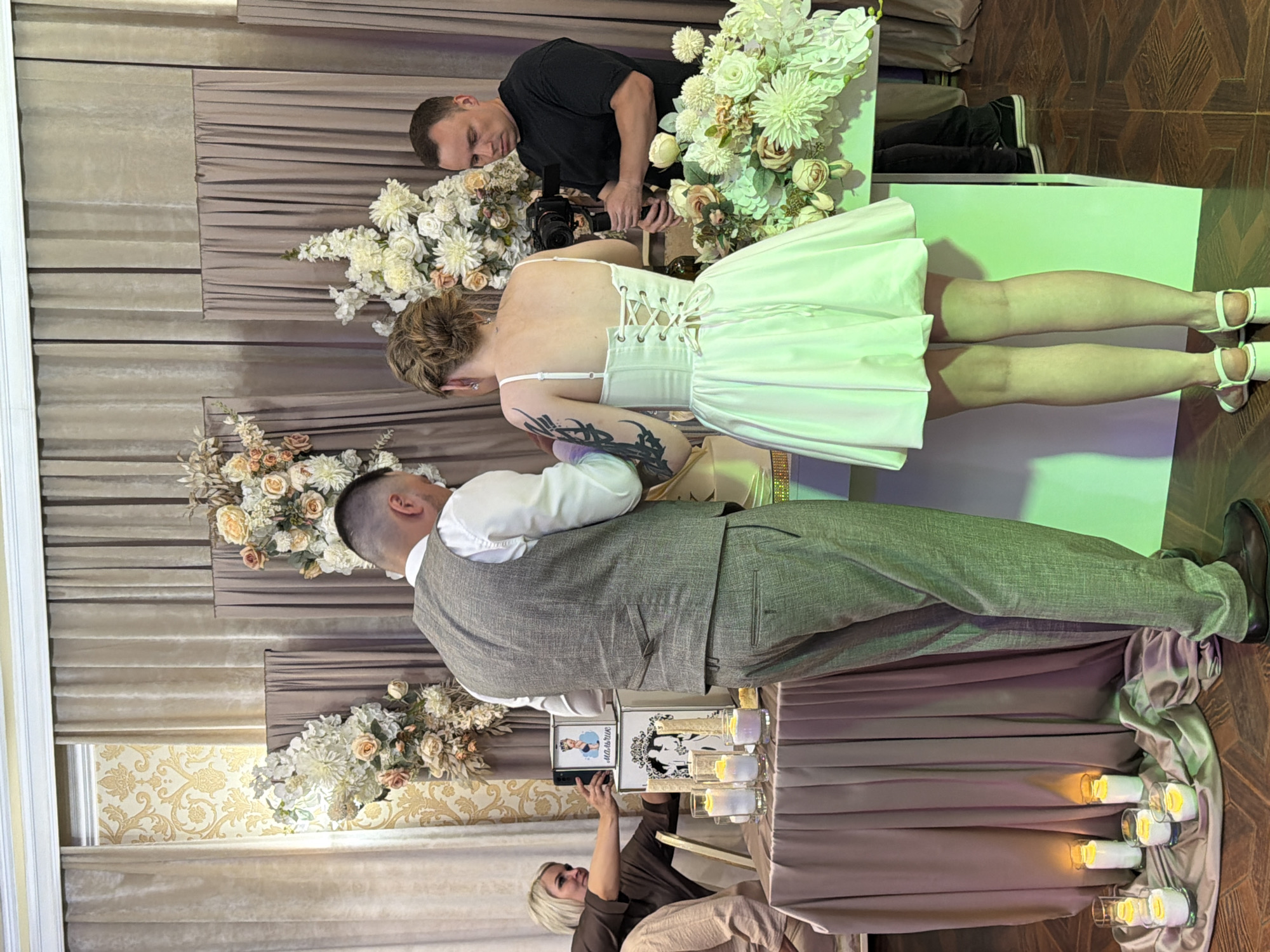 Wedding reception cake cutting ceremony in Chernushka, Russia