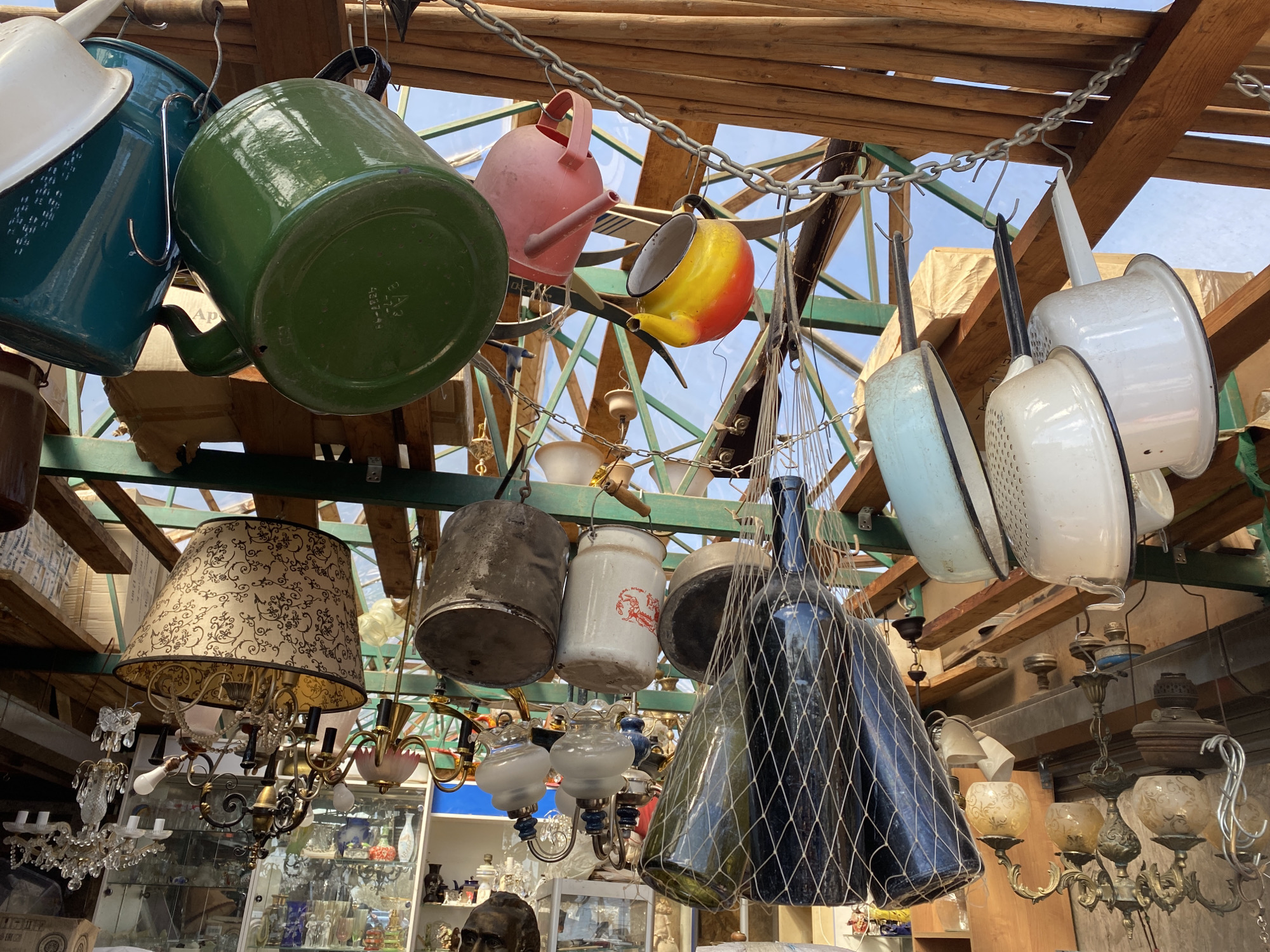 Moscow antique shop interior documented with cookware, bust, samovars