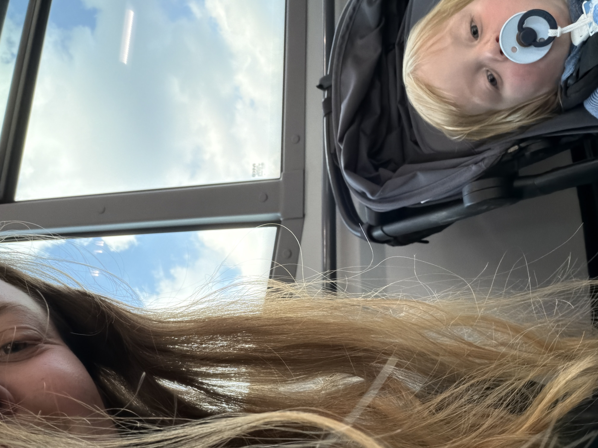 Two travelers observed through window in Solzago, Italy