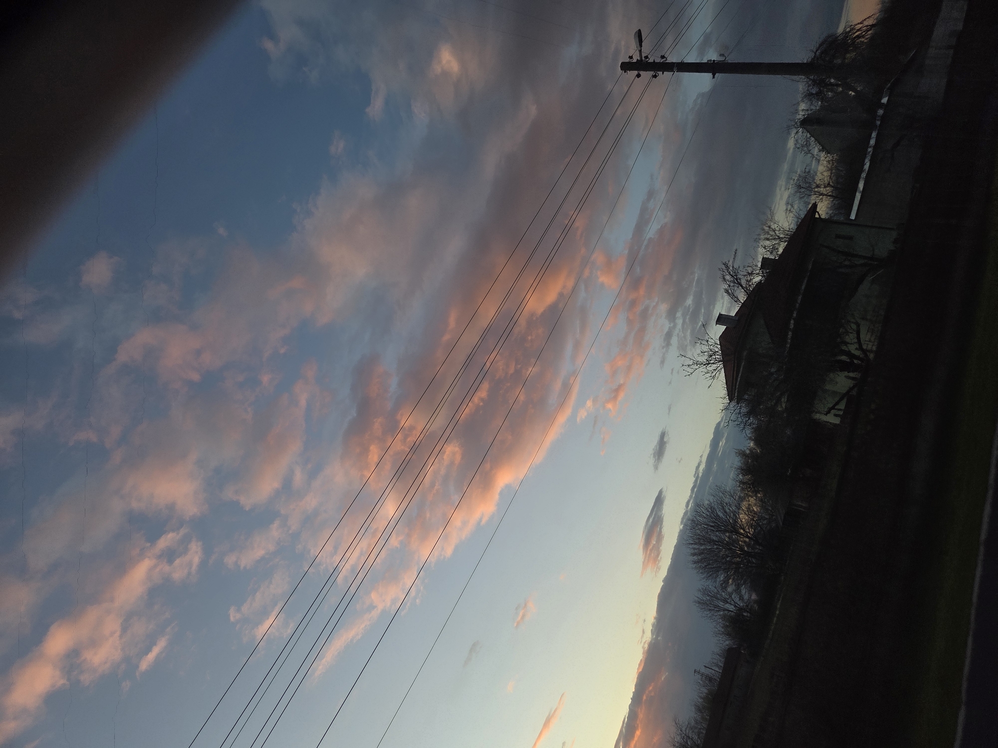 Twilight sky with pink clouds photographed in Koilovtsi, Bulgaria