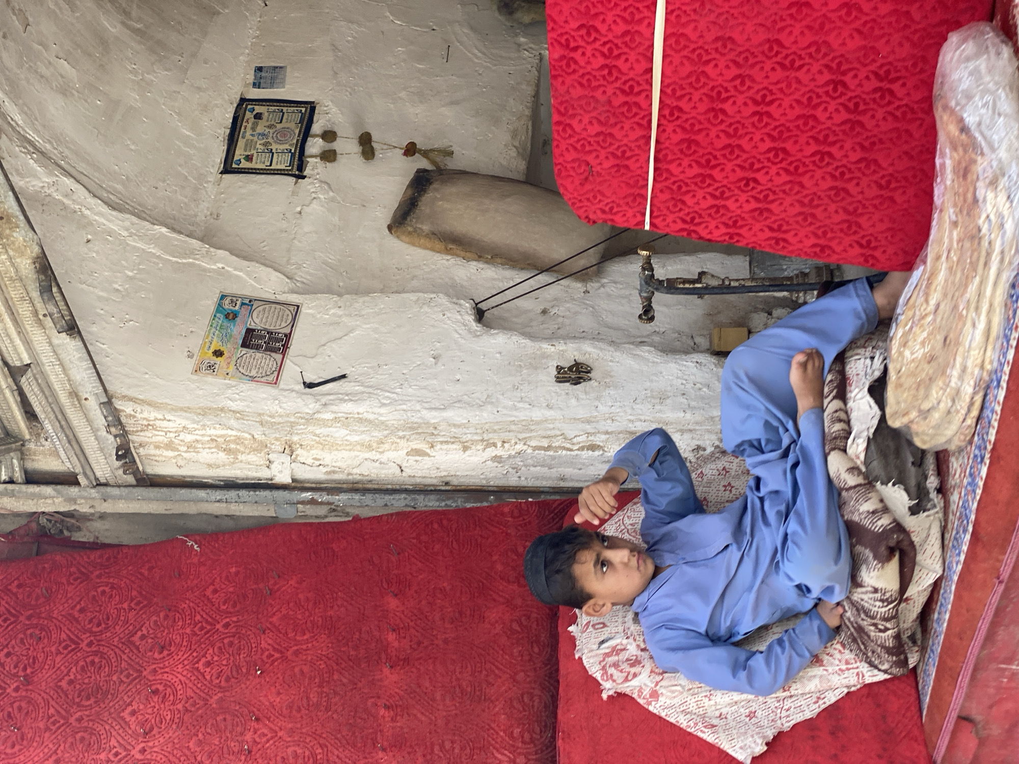 Market scenes across Kandahar showing vendors and produce stalls