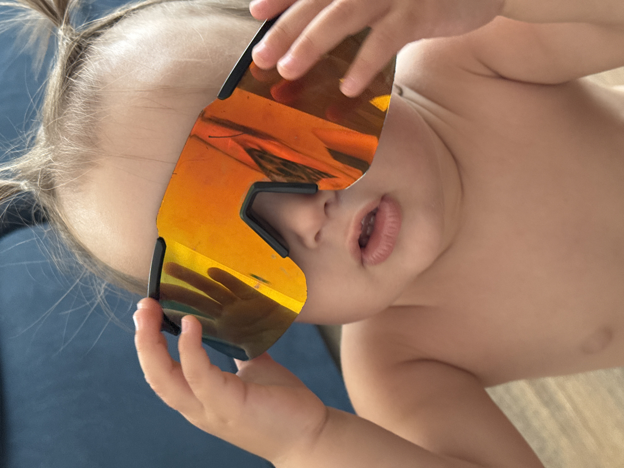 Casual home snapshots with a toddler, couch, and selfies