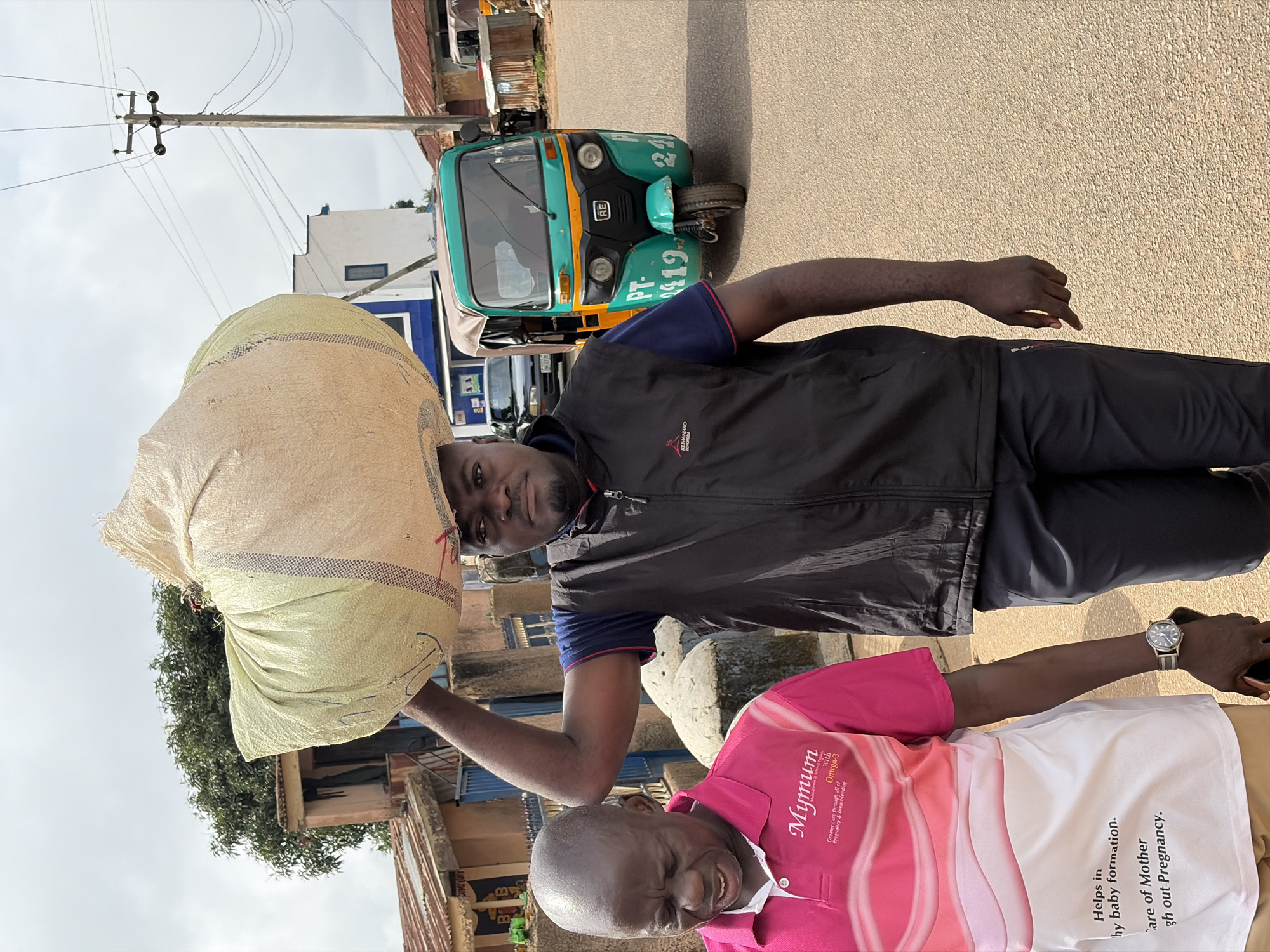 Everyday street life moving through Jos on a weekday morning