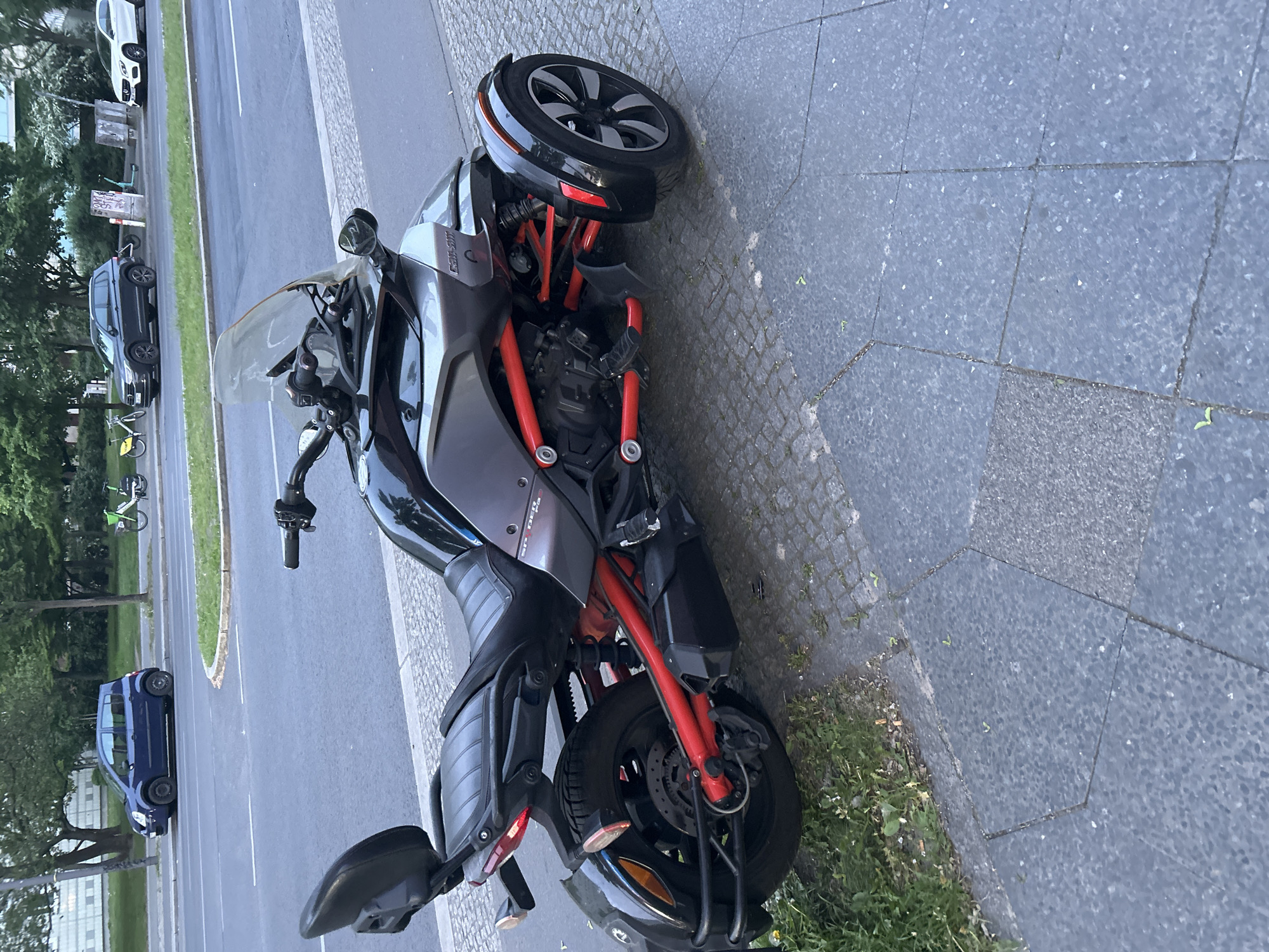 Can-Am Spyder motorcycle parked on Berlin sidewalk