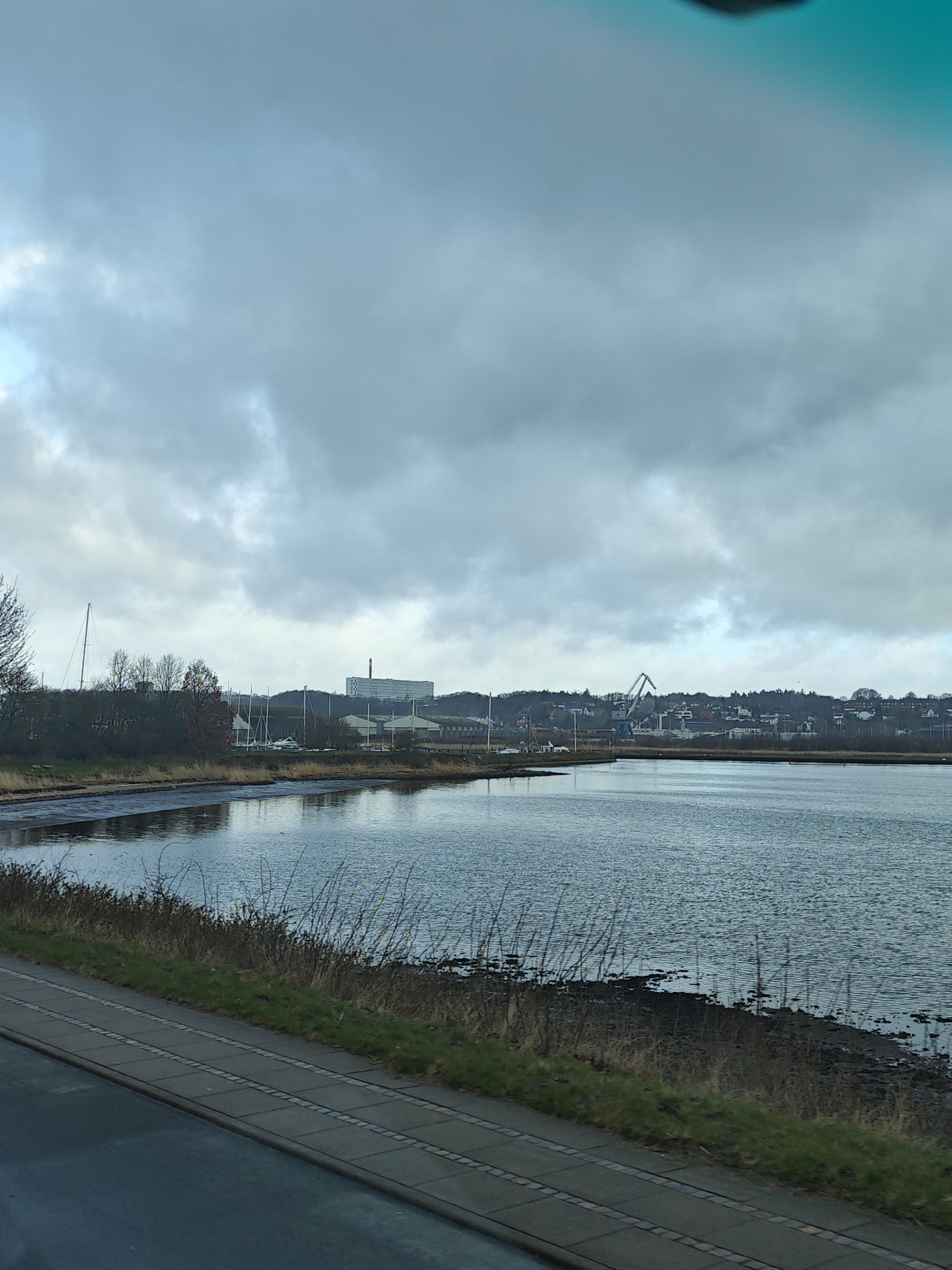 Overcast waterfront scene captured in Kolding, Denmark