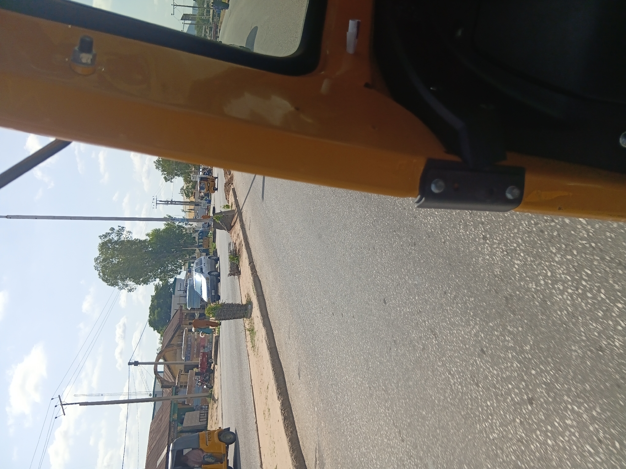 Street life documented in Jalingo, Nigeria during afternoon hours