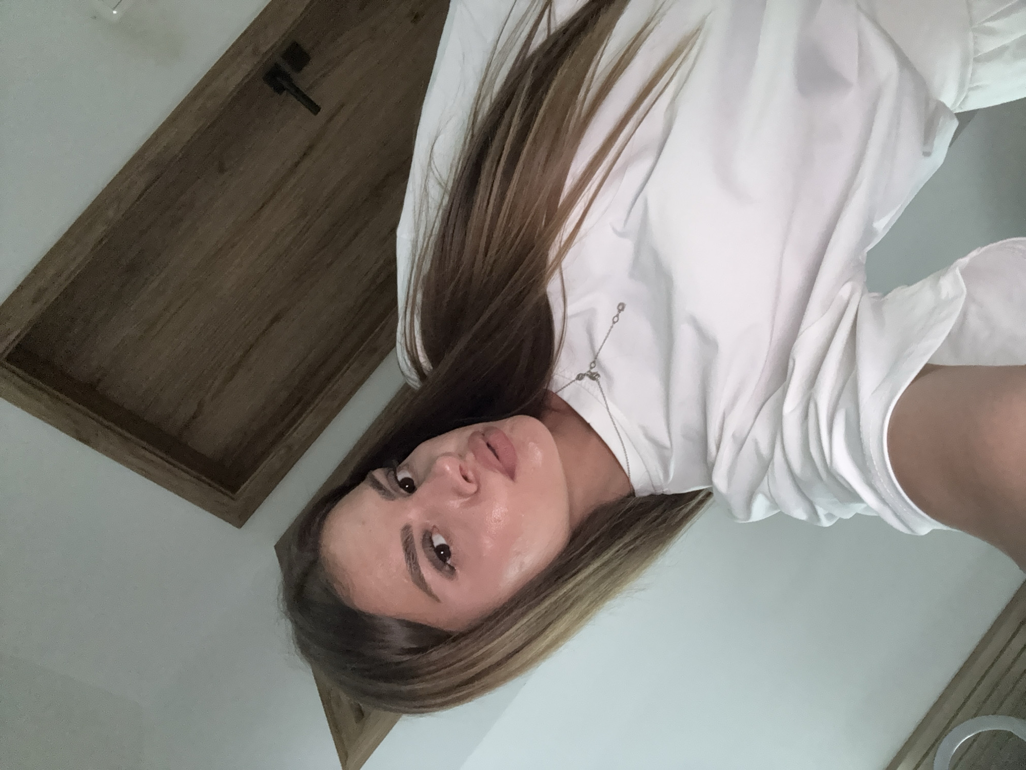 Selfie session in Plovdiv, white outfits, indoor setting