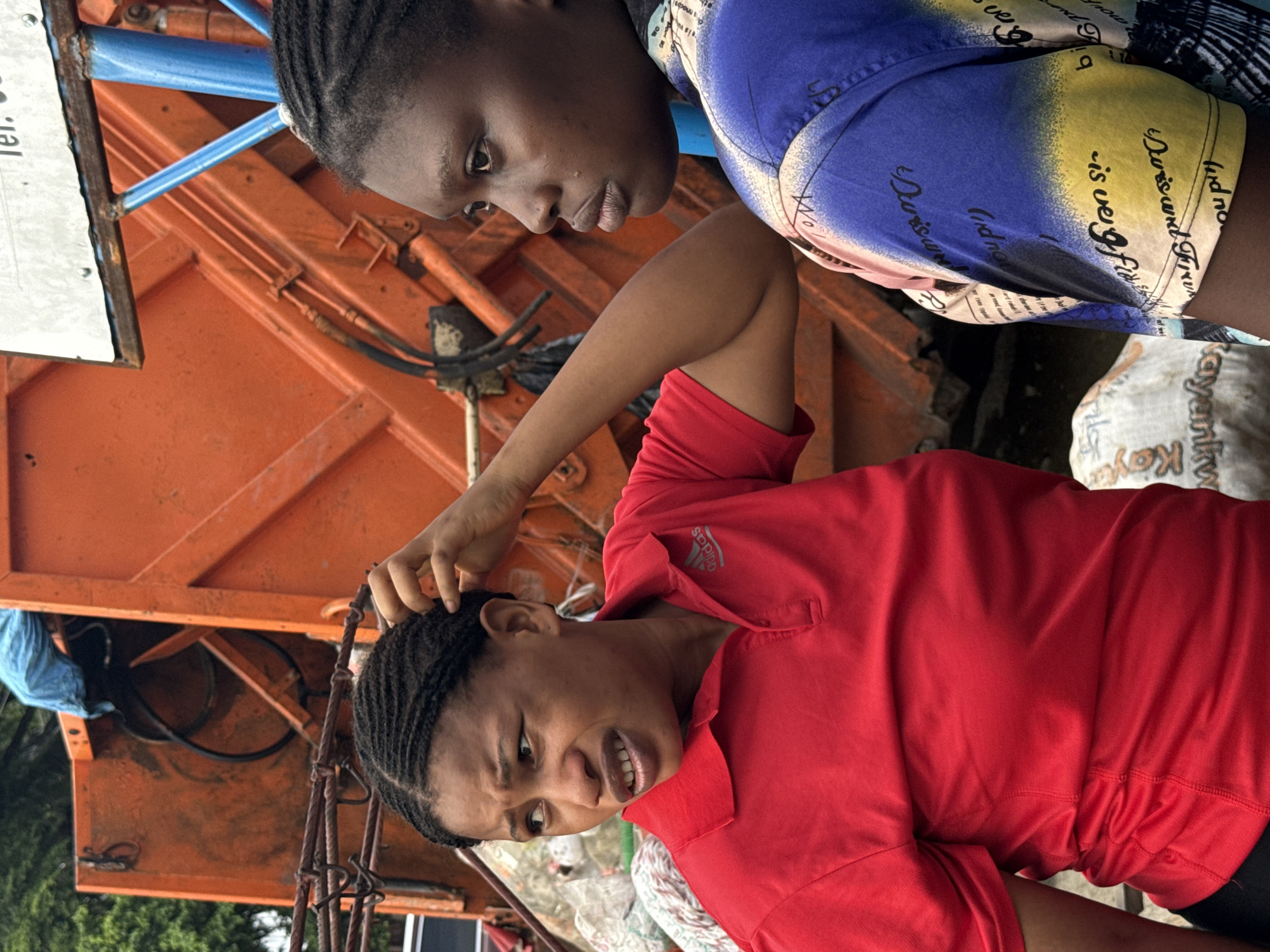 Street scenes in Ado: market stalls and plastic waste collection