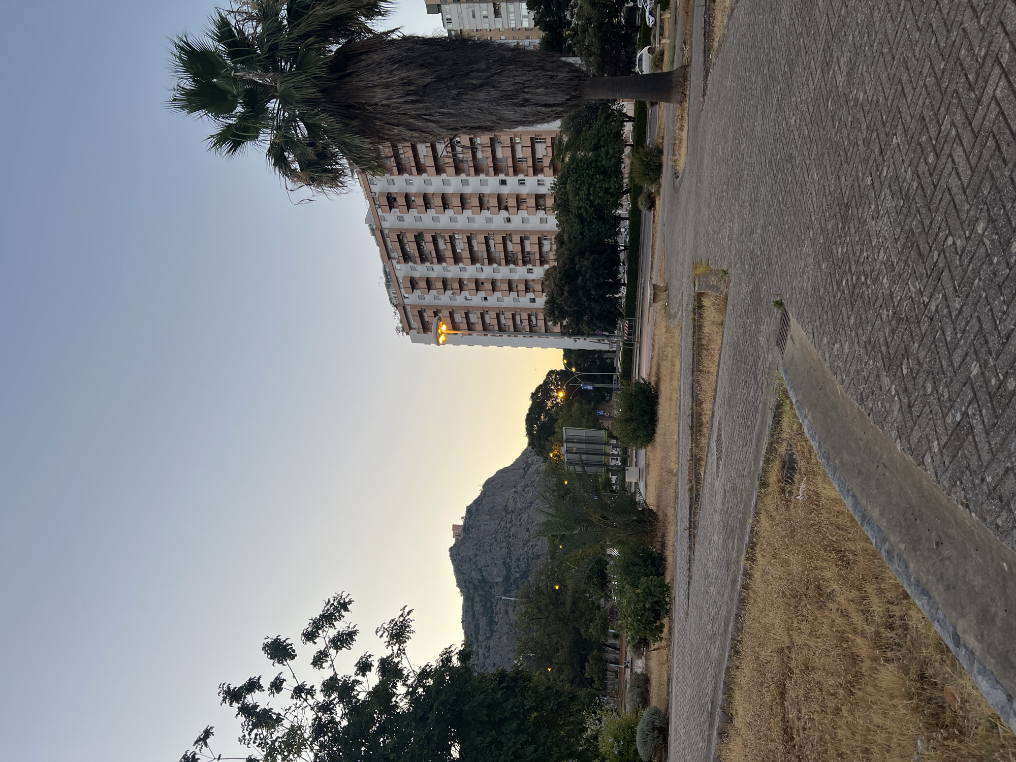 Dusk settles over Palermo's Monte Pellegrino neighborhood