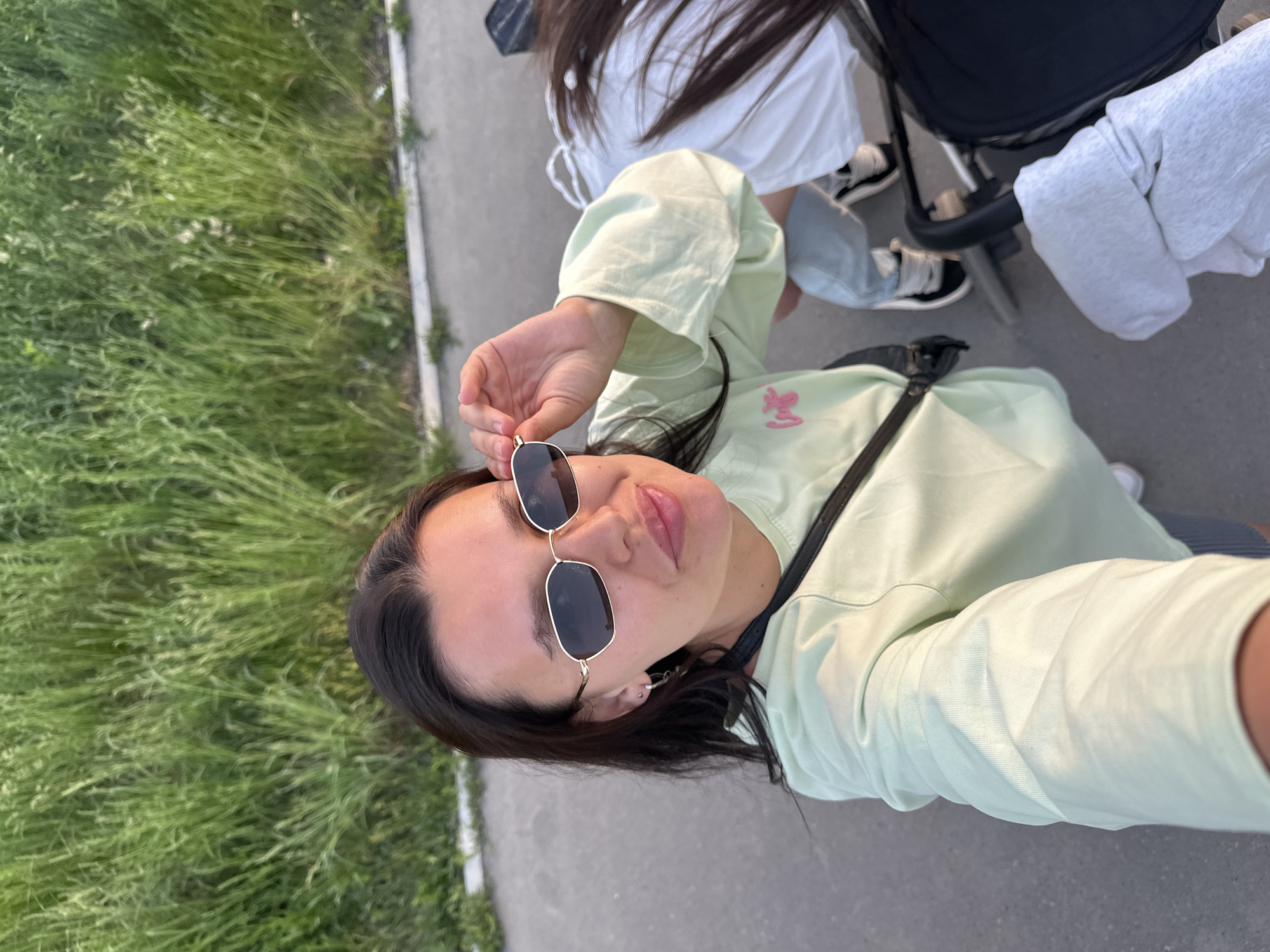 Friends take sunset selfies during stroll in Chaikovsky, Russia