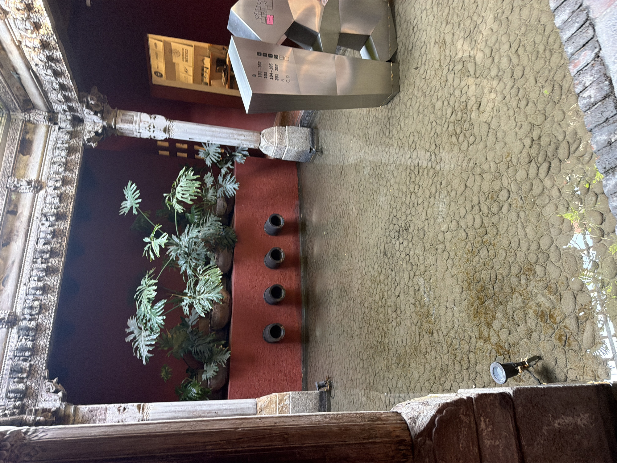 Colonial courtyard with cobblestone surface documented in Puebla