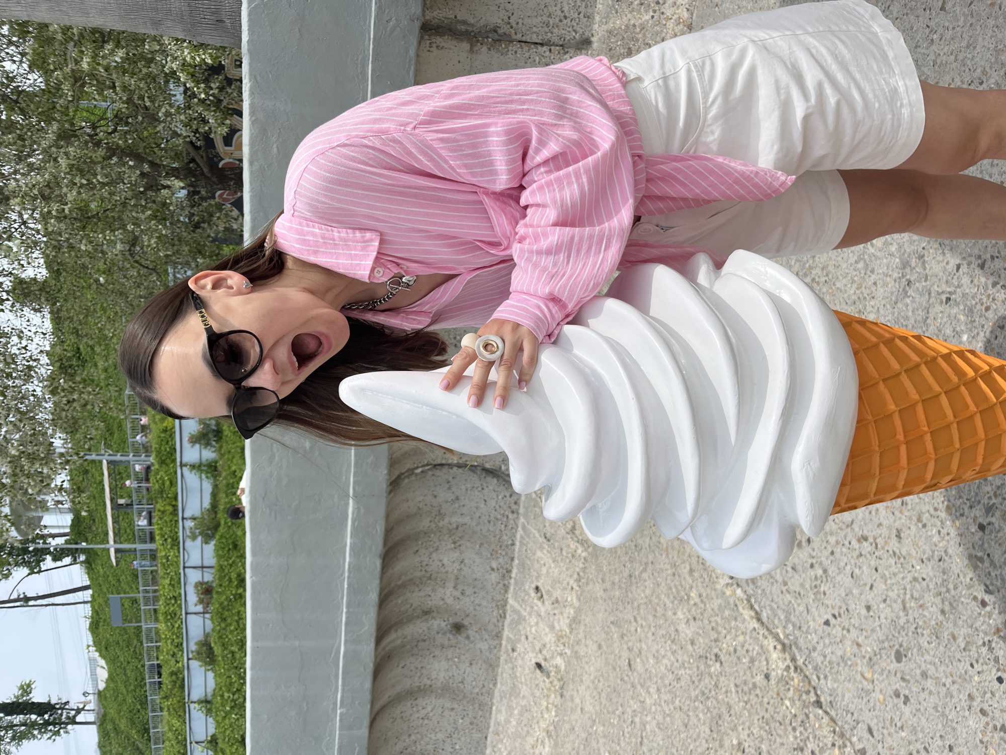 Beach day at Sochi's pebbled shores with ice cream sculpture