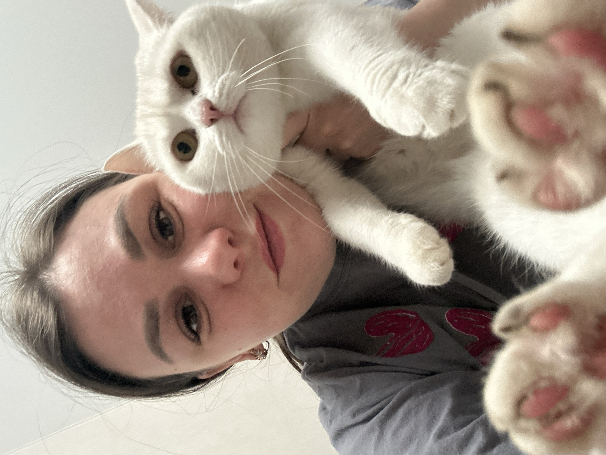 Family moments with toddler, baby, and cat captured in Chaikovsky