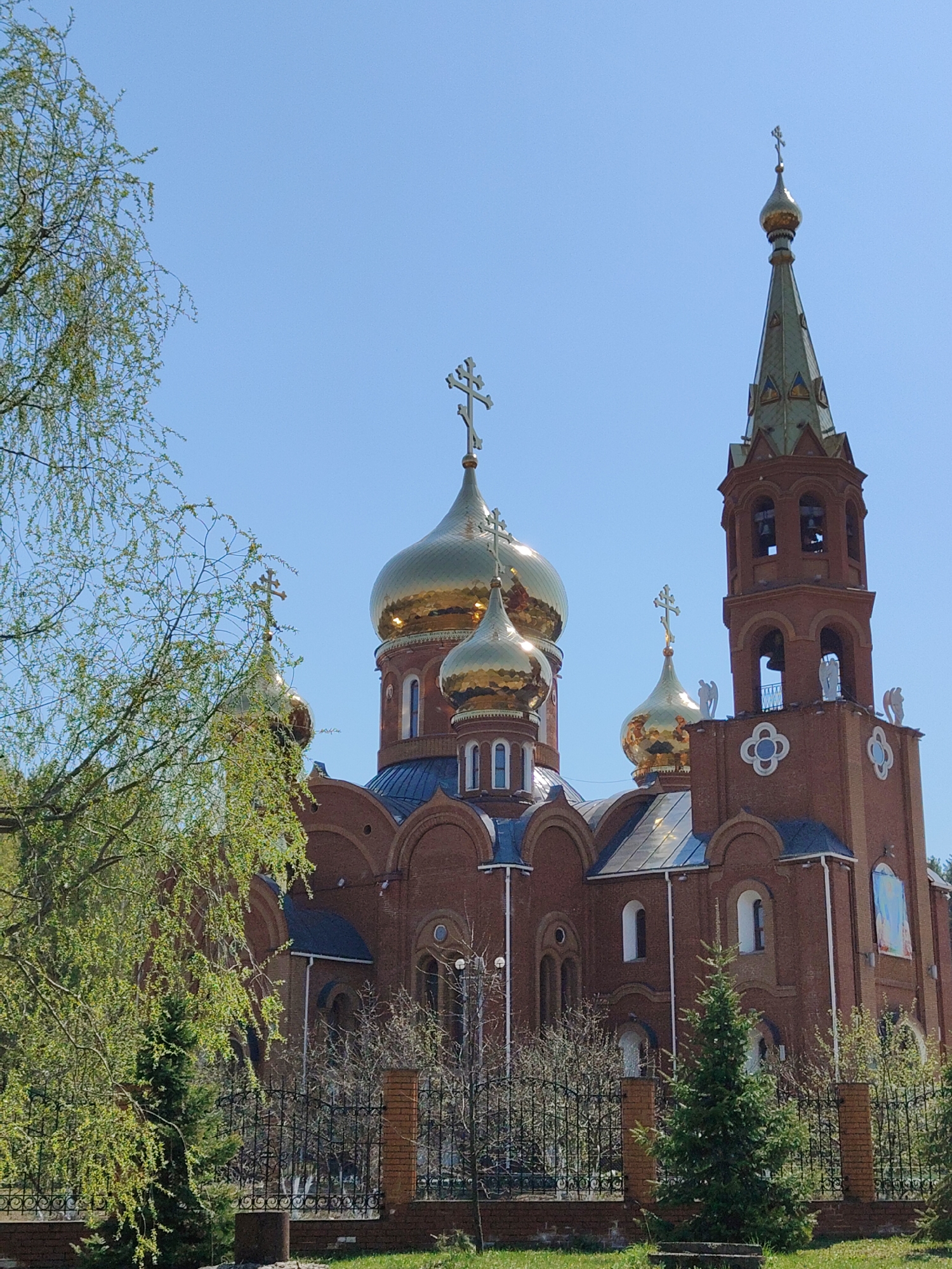 Orthodox Cathedral with Golden Domes Observed in Urban Setting