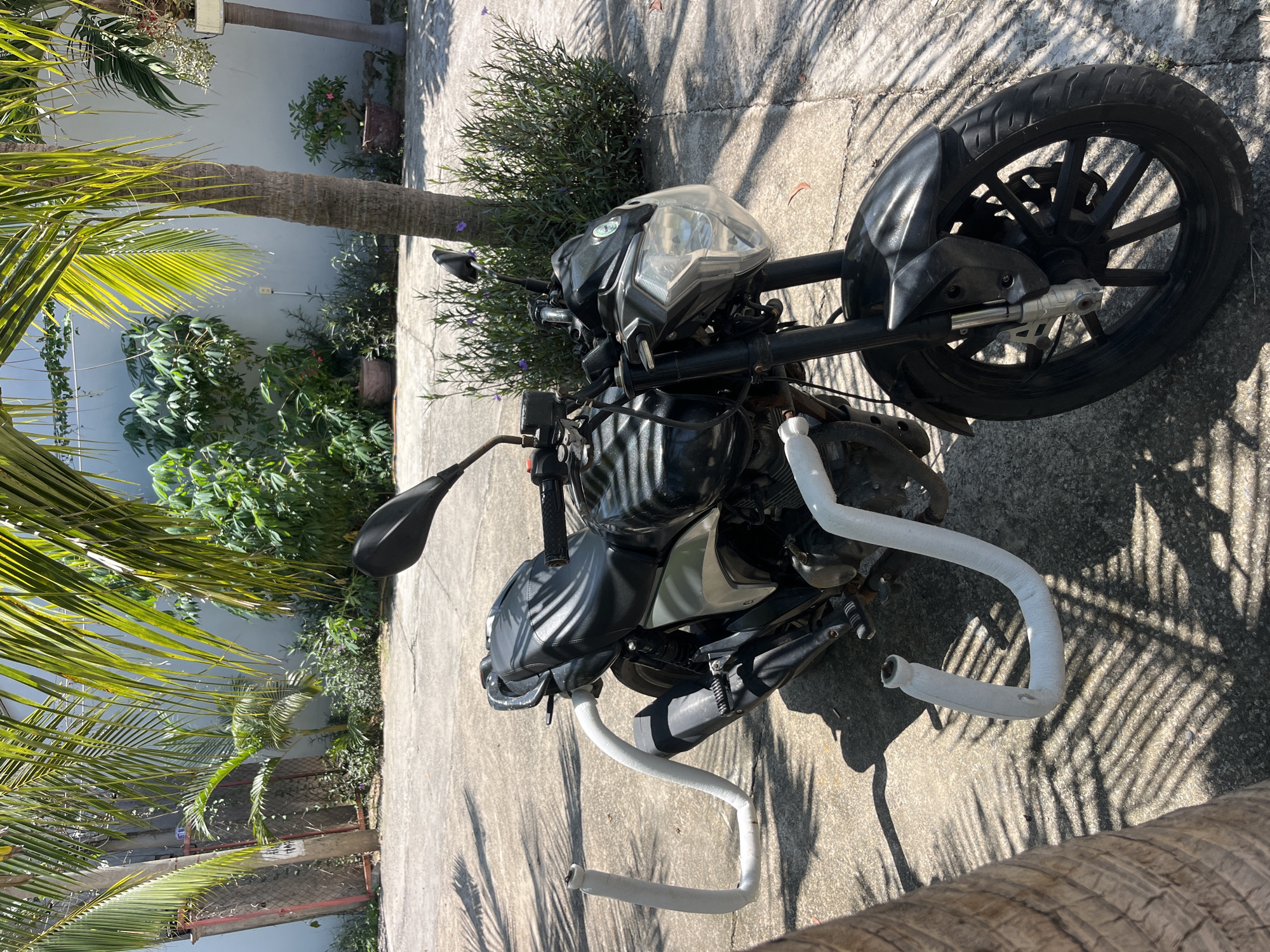Motorcyclist's casual stops for drinks and currency exchange in Vietnam