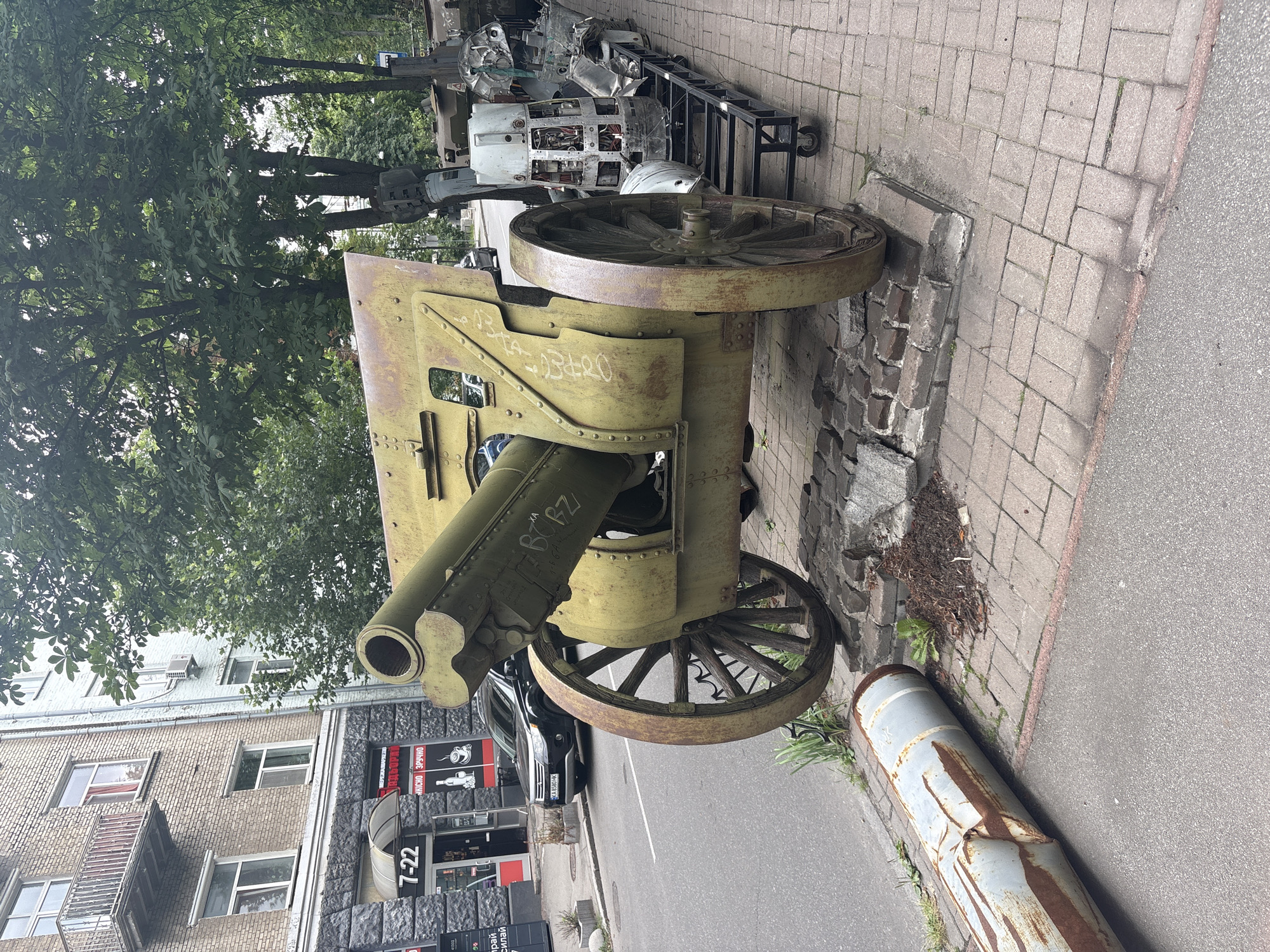Destroyed Russian hardware on Kyiv sidewalks, alongside city life