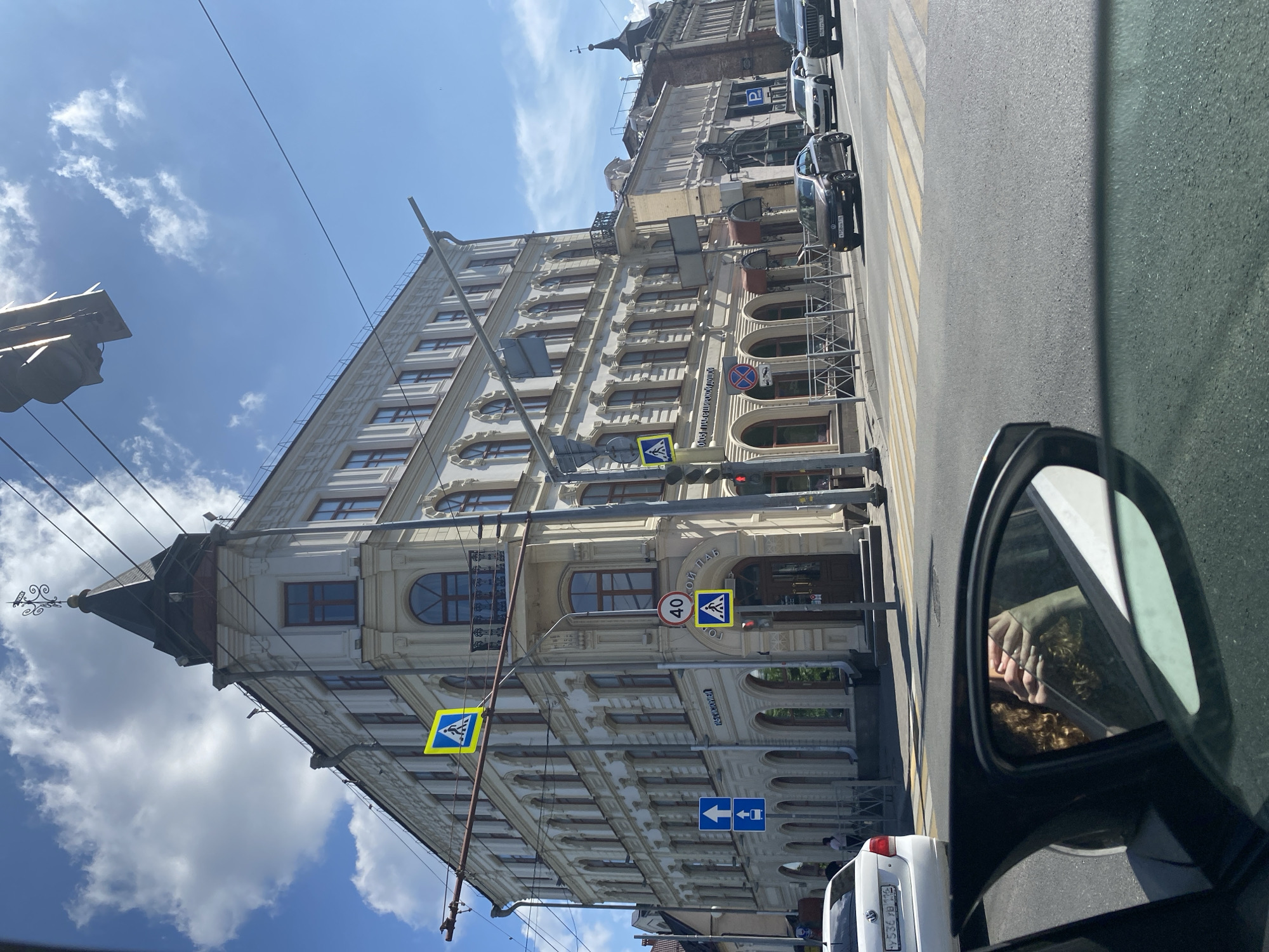 Sunny street views in Kazan featuring prominent buildings