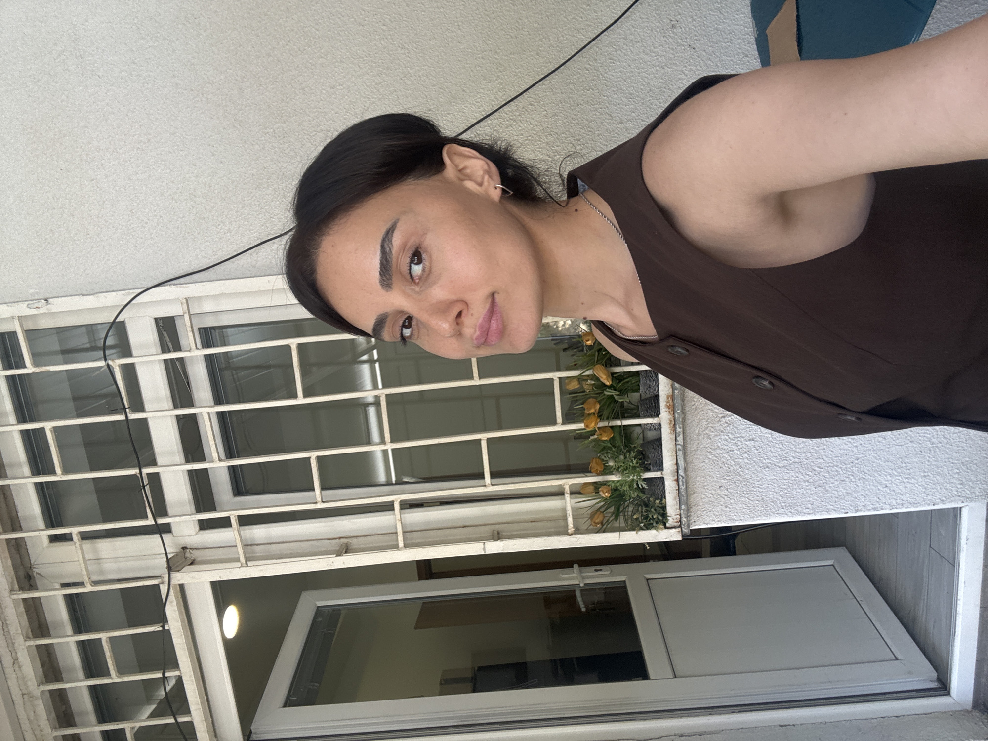 Quick selfie session across a Tbilisi café and balcony