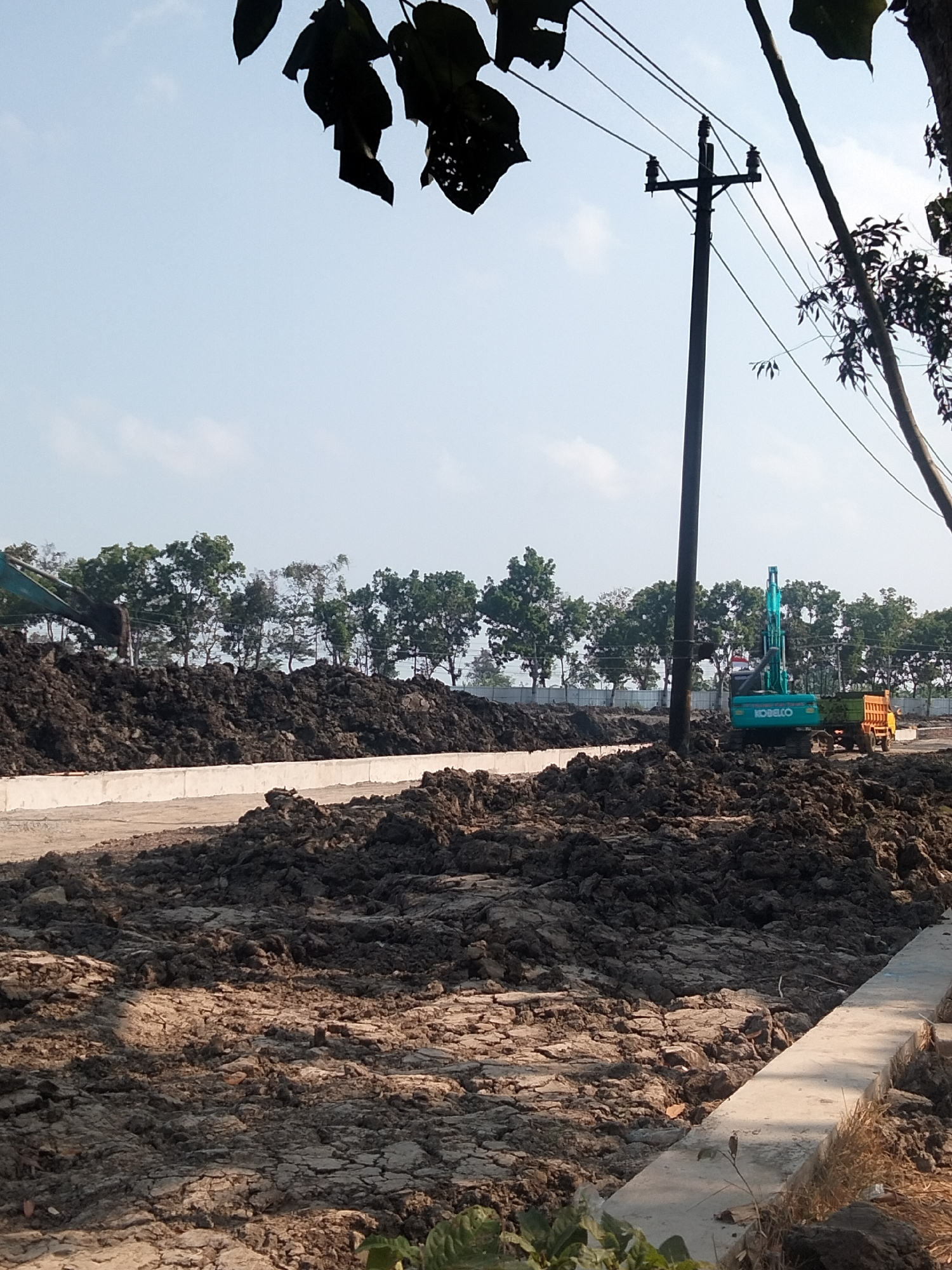 Excavators at work on a Sikampuh construction site