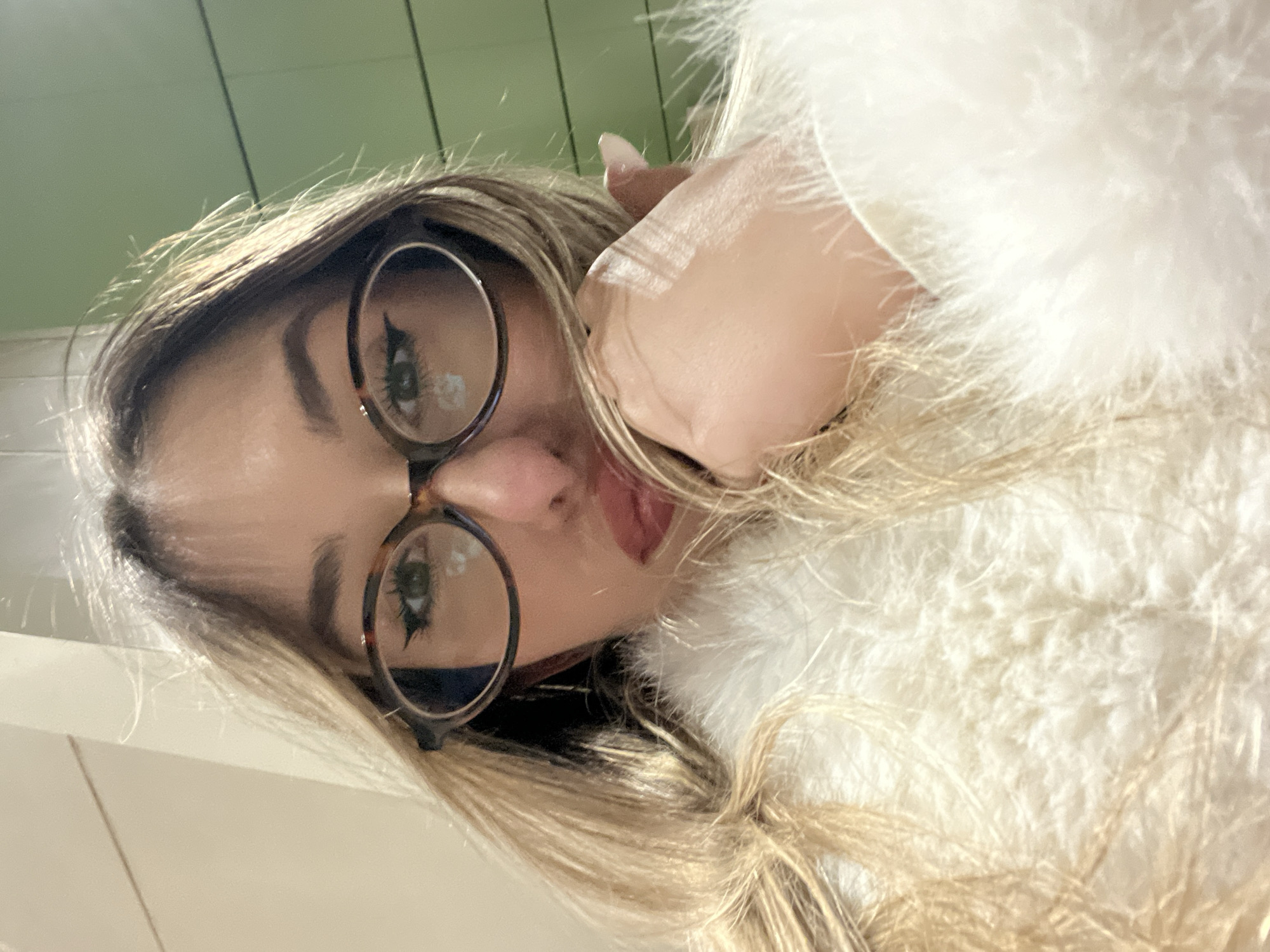 Woman takes selfies on Sofia metro train