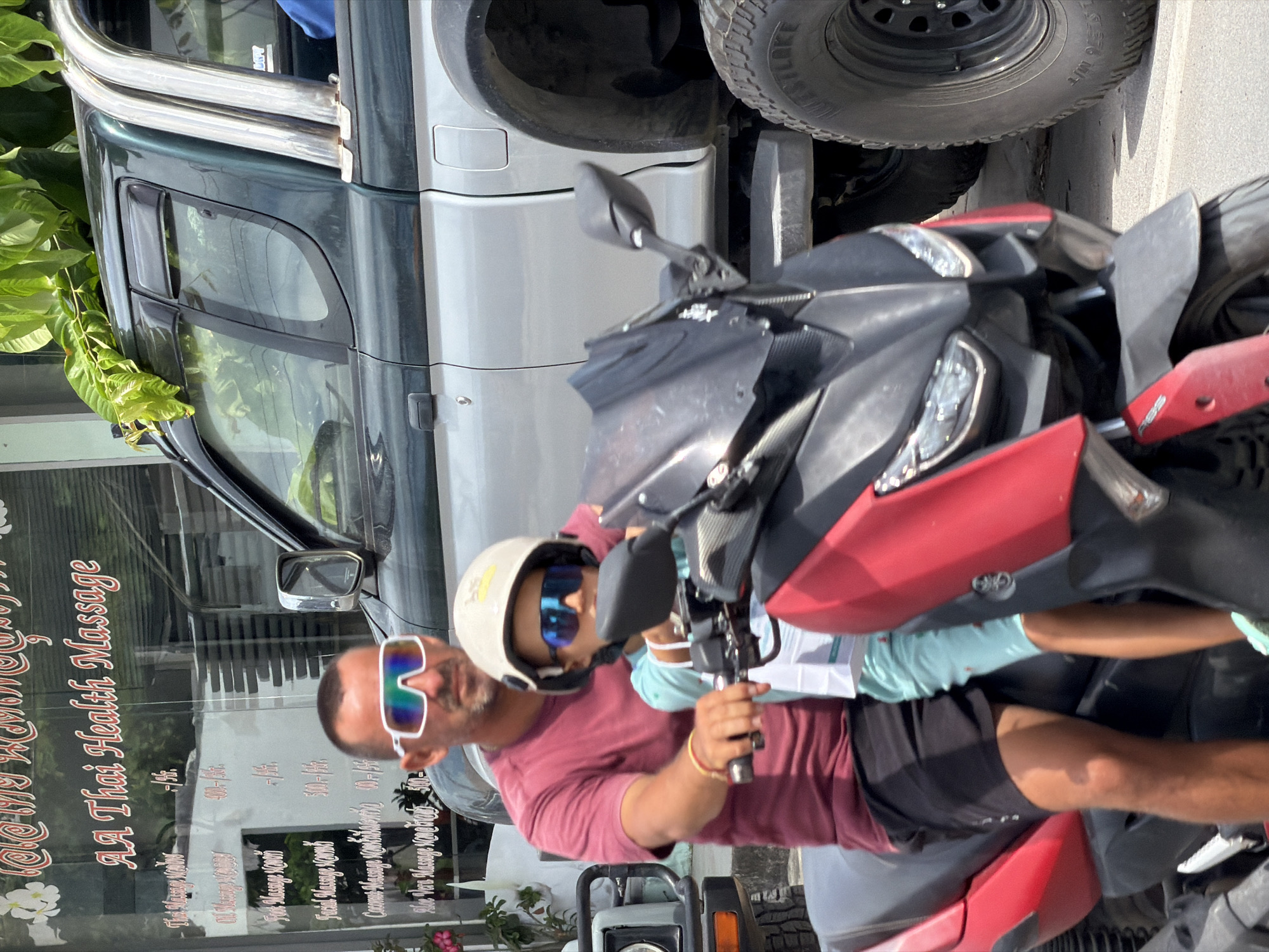 Scooter traffic flowing through Baan Bo Phut streets