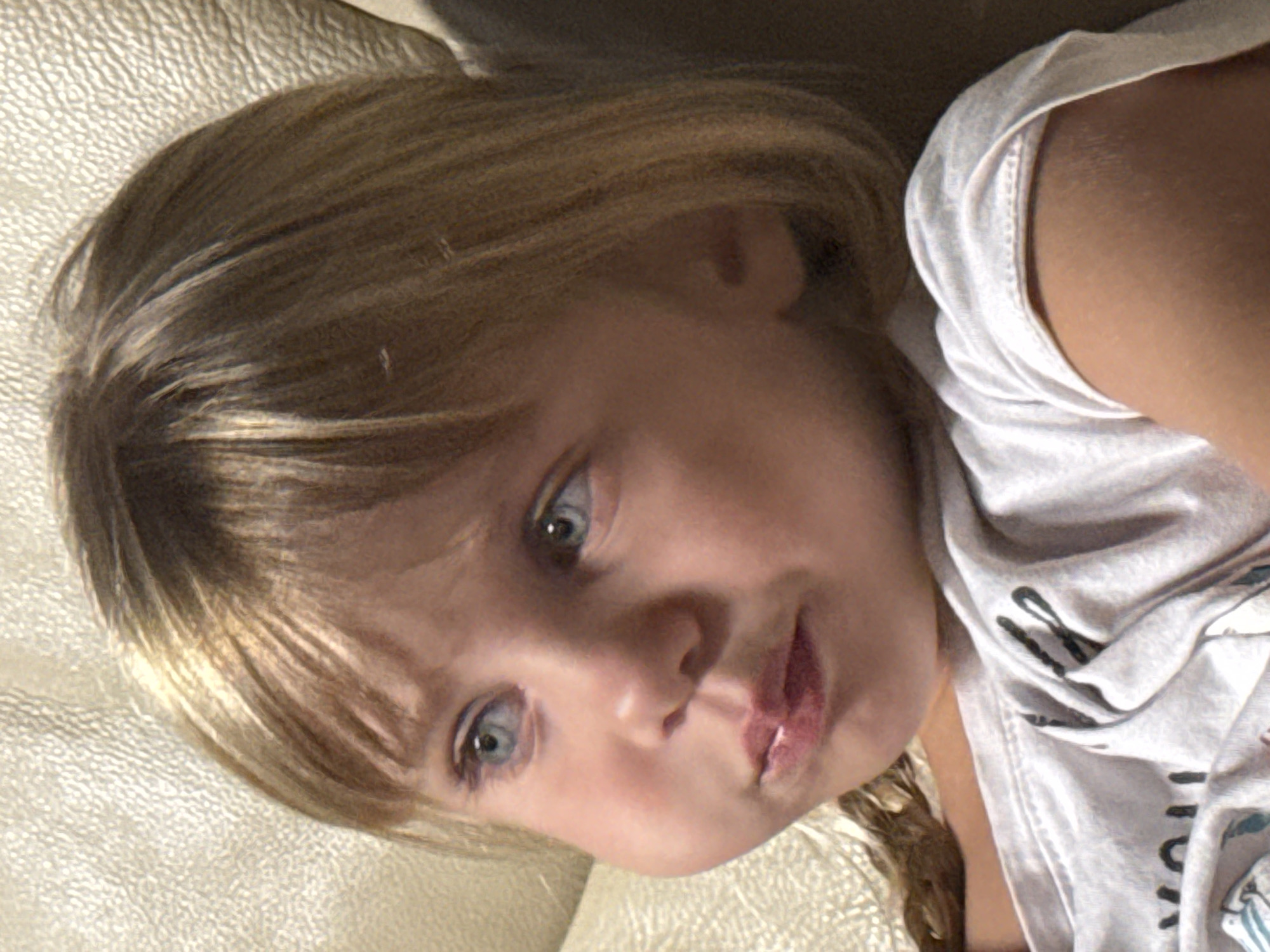 Quiet at-home moments with a child relaxing on the couch