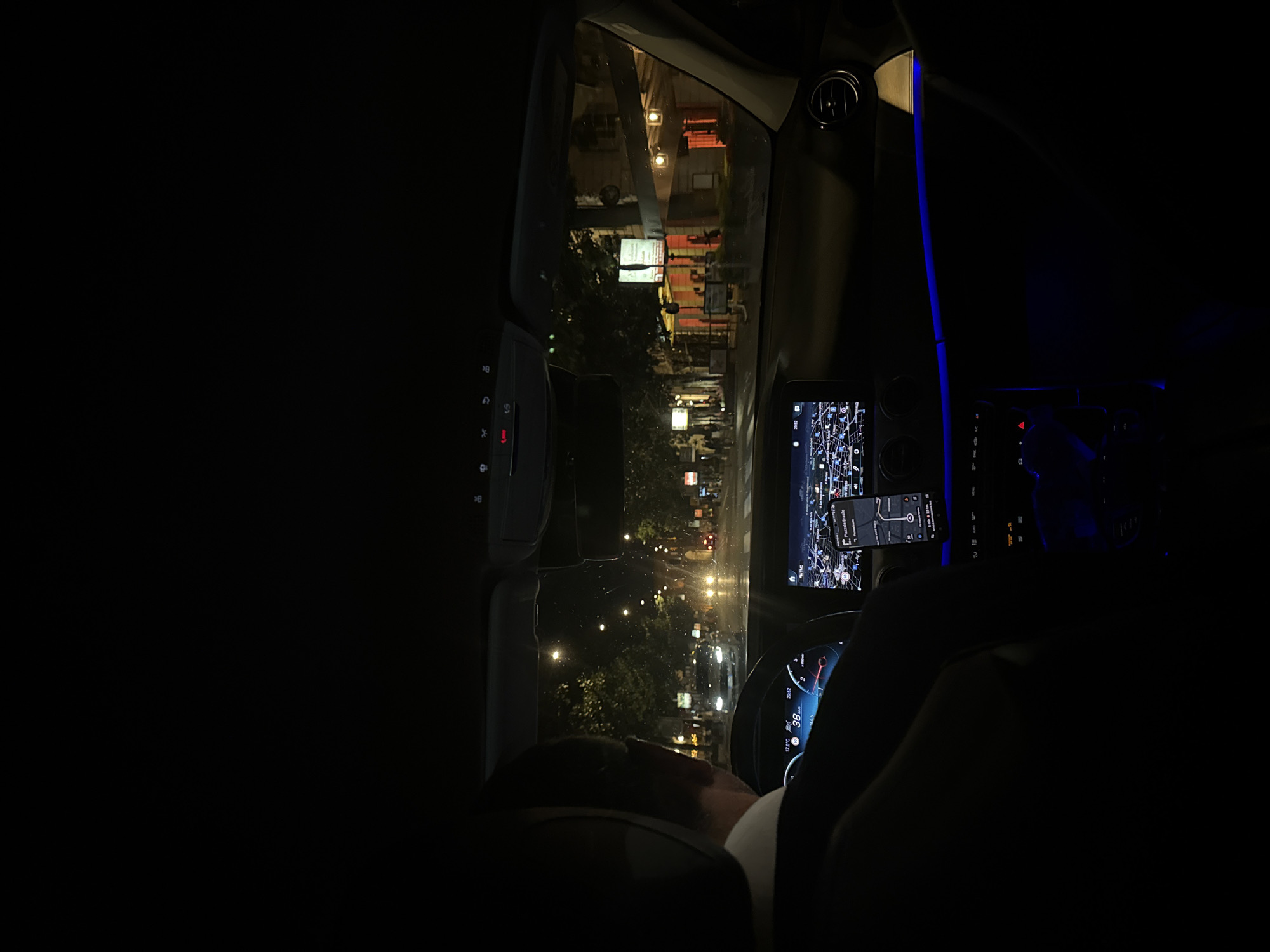 Nighttime car journey captured in Rome streets